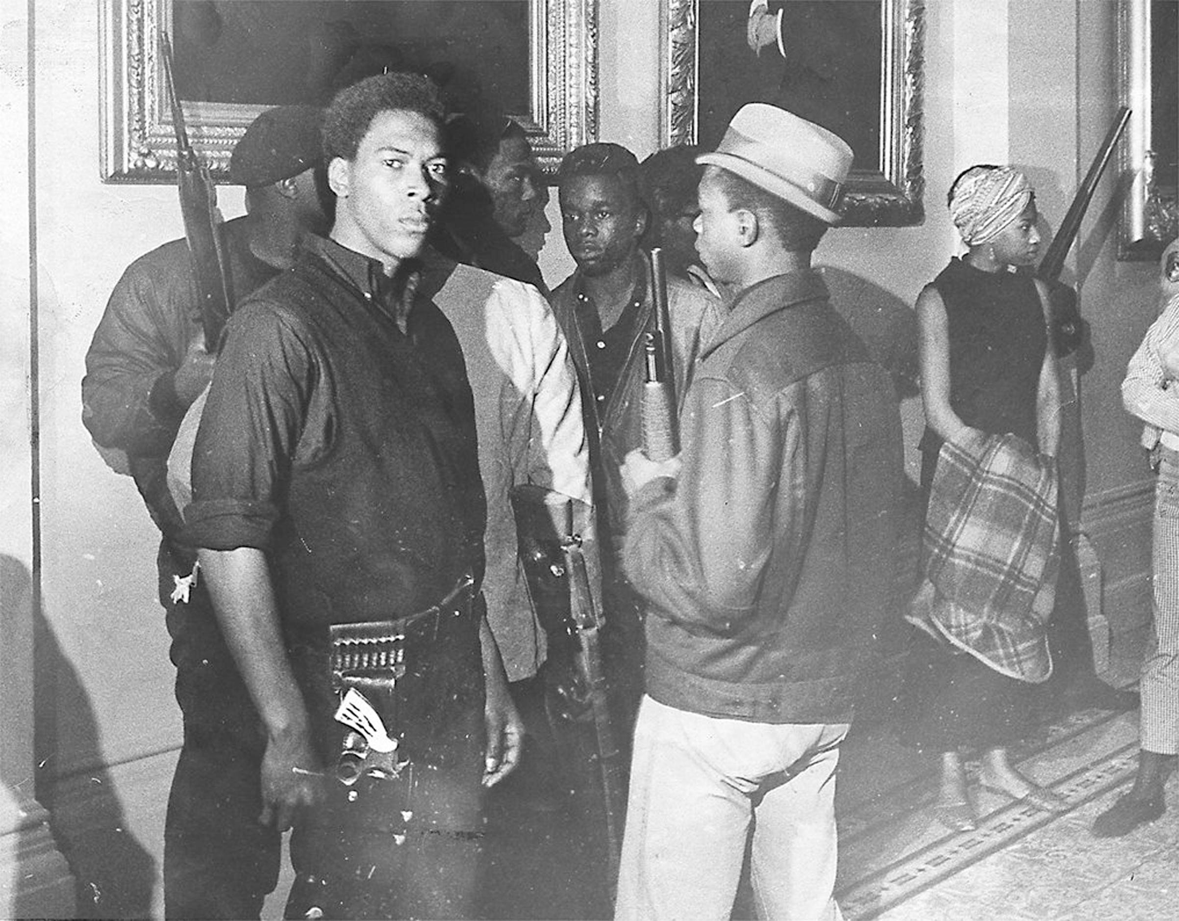 Members of the Black Panthers hold guns during the group's protest at the California Assembly in May 1967 in Sacramento, California.