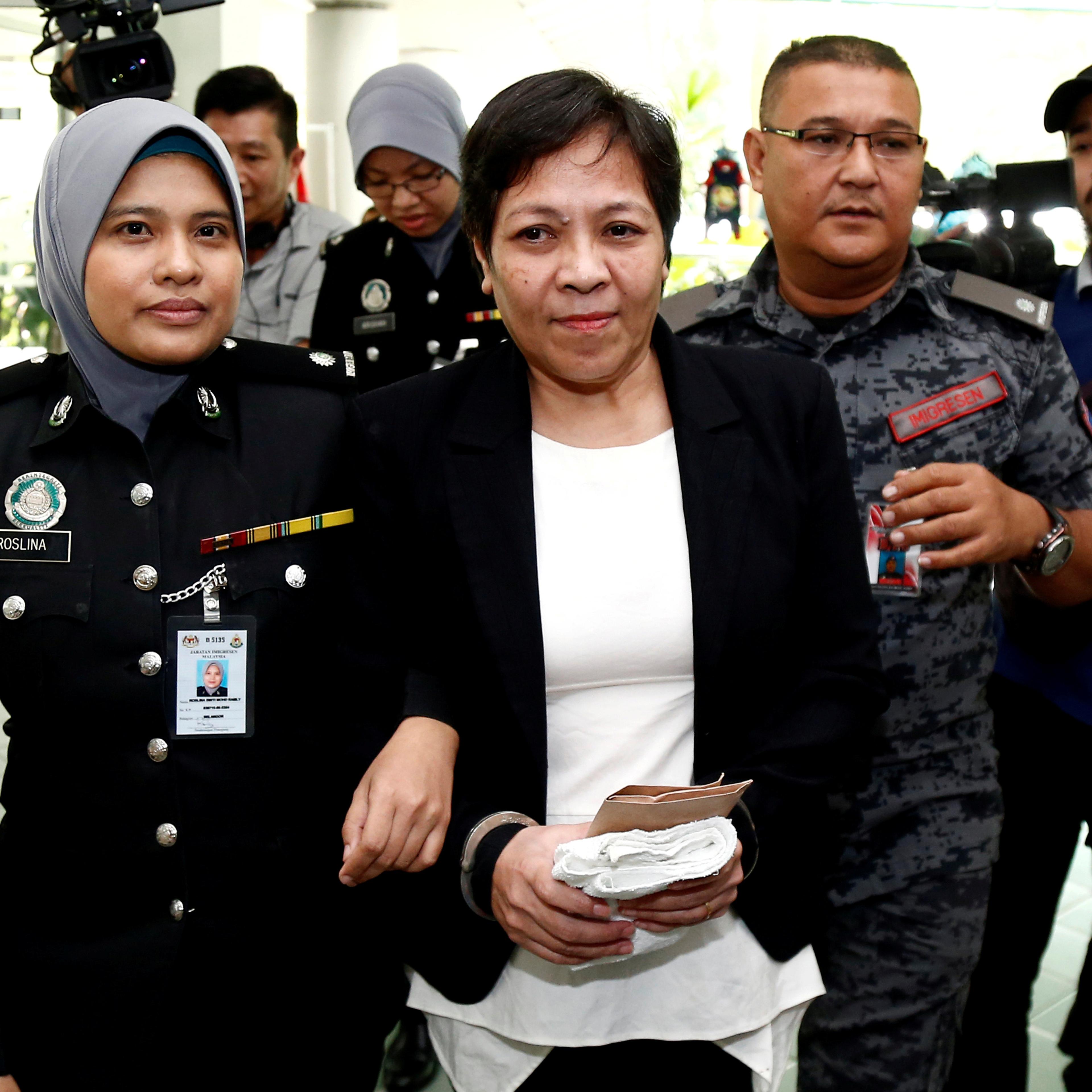 FILE PHOTO: Australian Maria Elvira Pinto Exposto leaves following her release at the High Court in Shah Alam