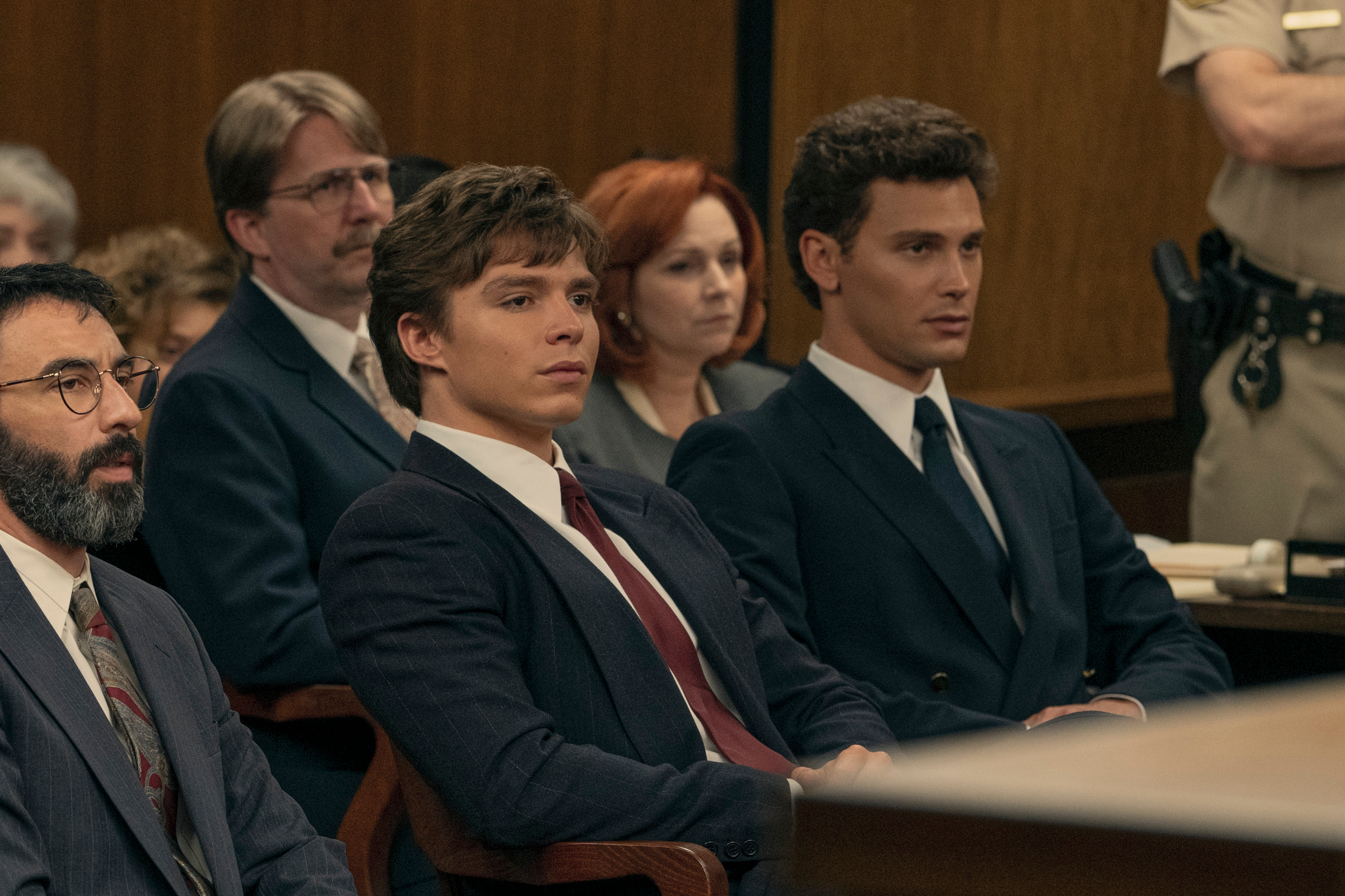 Brad Culver as Gerald Chaleff, Nicholas Chavez as Lyle Menendez, and Cooper Koch as Erik Menendez in Episode 7 of 'Monsters: The Lyle And Erik Menendez Story.'