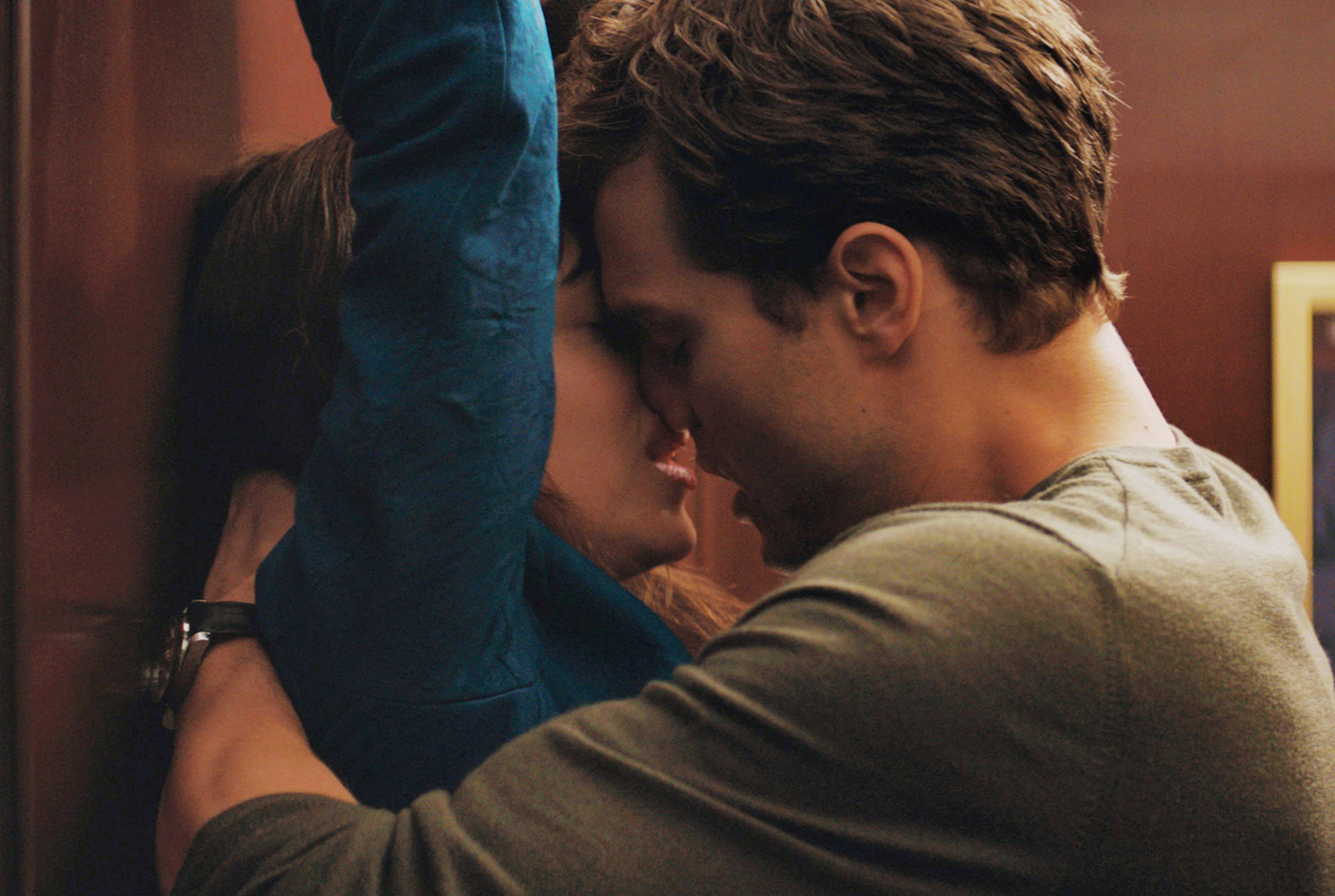 FIFTY SHADES OF GREY, l-r: Dakota Johnson, Jamie Dornan, 2015. ph: Chuck Zlotnick/©Focus