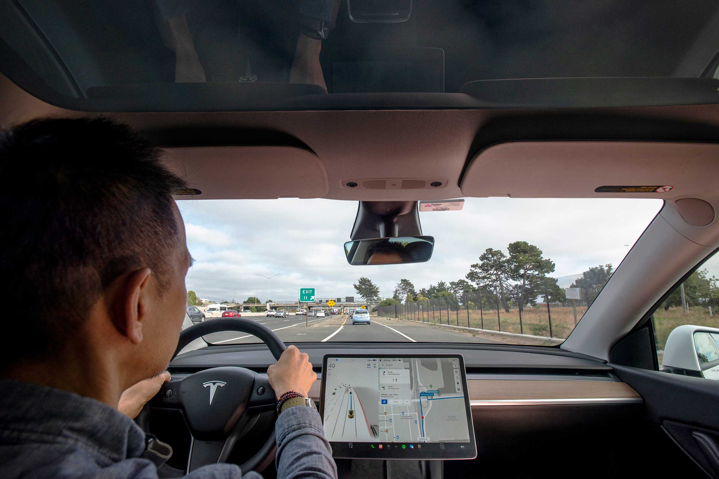 Tesla driving on road
