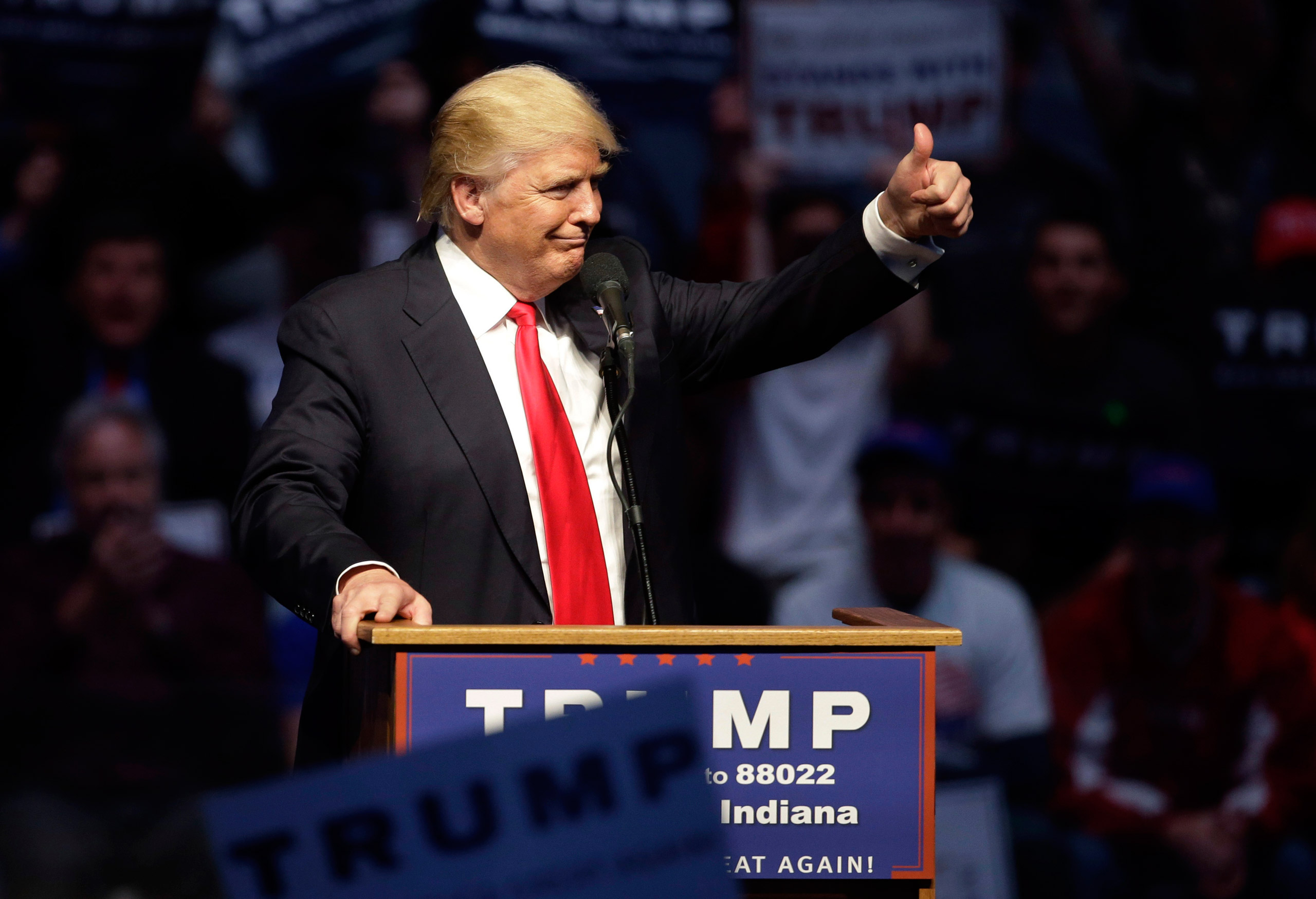 FILE - In this April 27, 2016 file photo, Republican presidential candidate Donald Trump gestures during a campaign stop in Indianapolis. Trump has a Plan B on campaign money, and it involves the sort of outside groups that he has called "corrupt." While