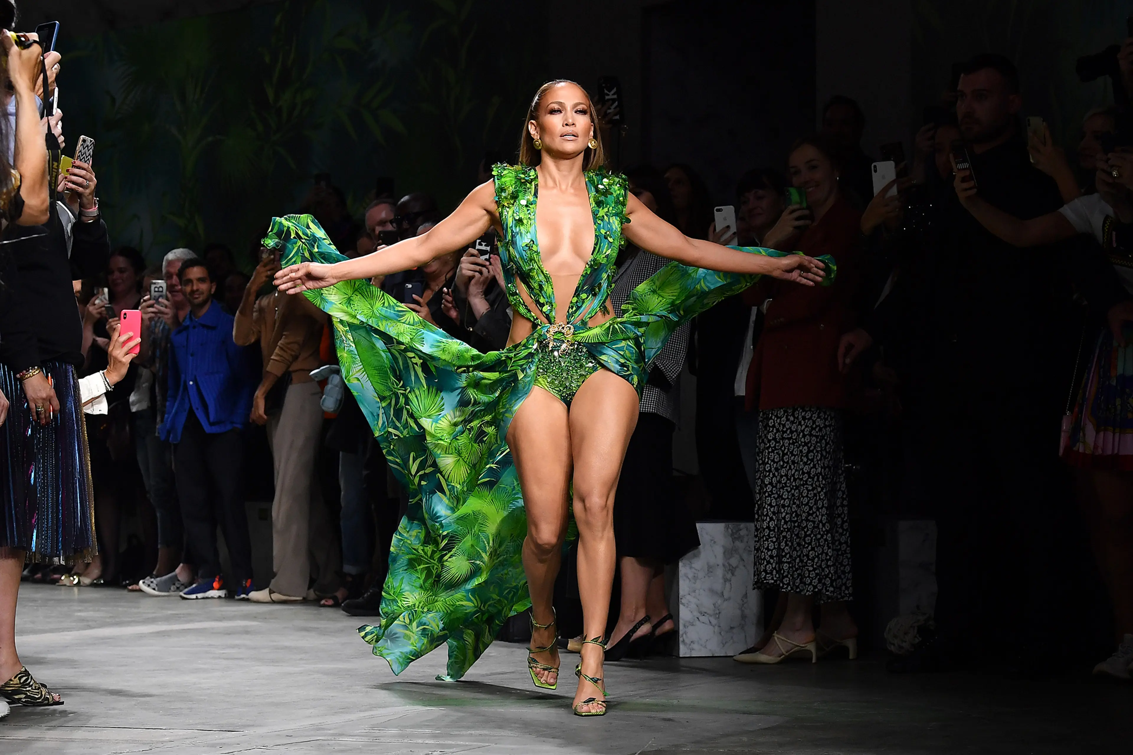 green versace dress of jennifer lopez designer Jennifer Lopez Wore an Updated Version of Her Iconic Green Dress at the Versace SS20 Show During Milan Fashion Week