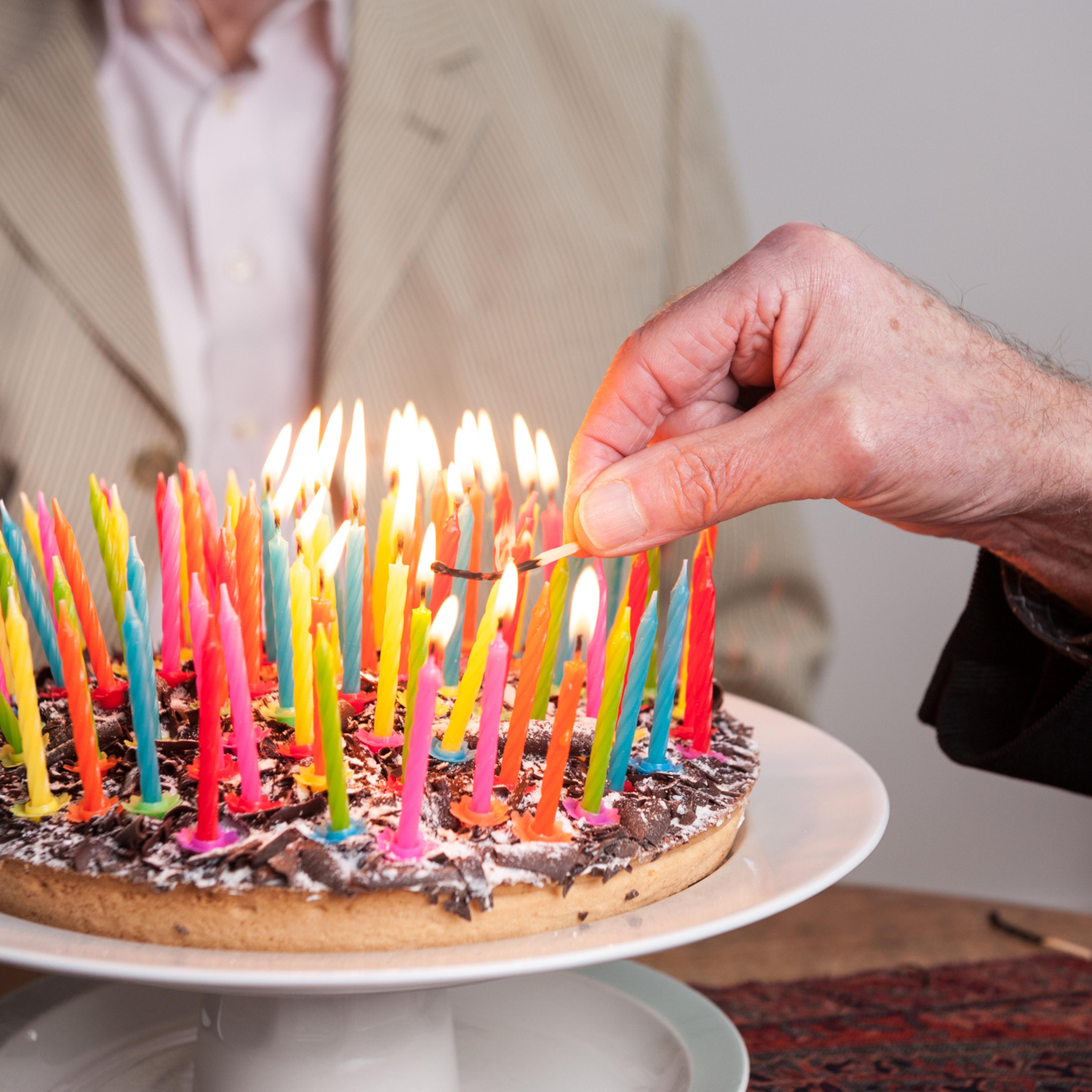 Lighting 93 candles on a cake