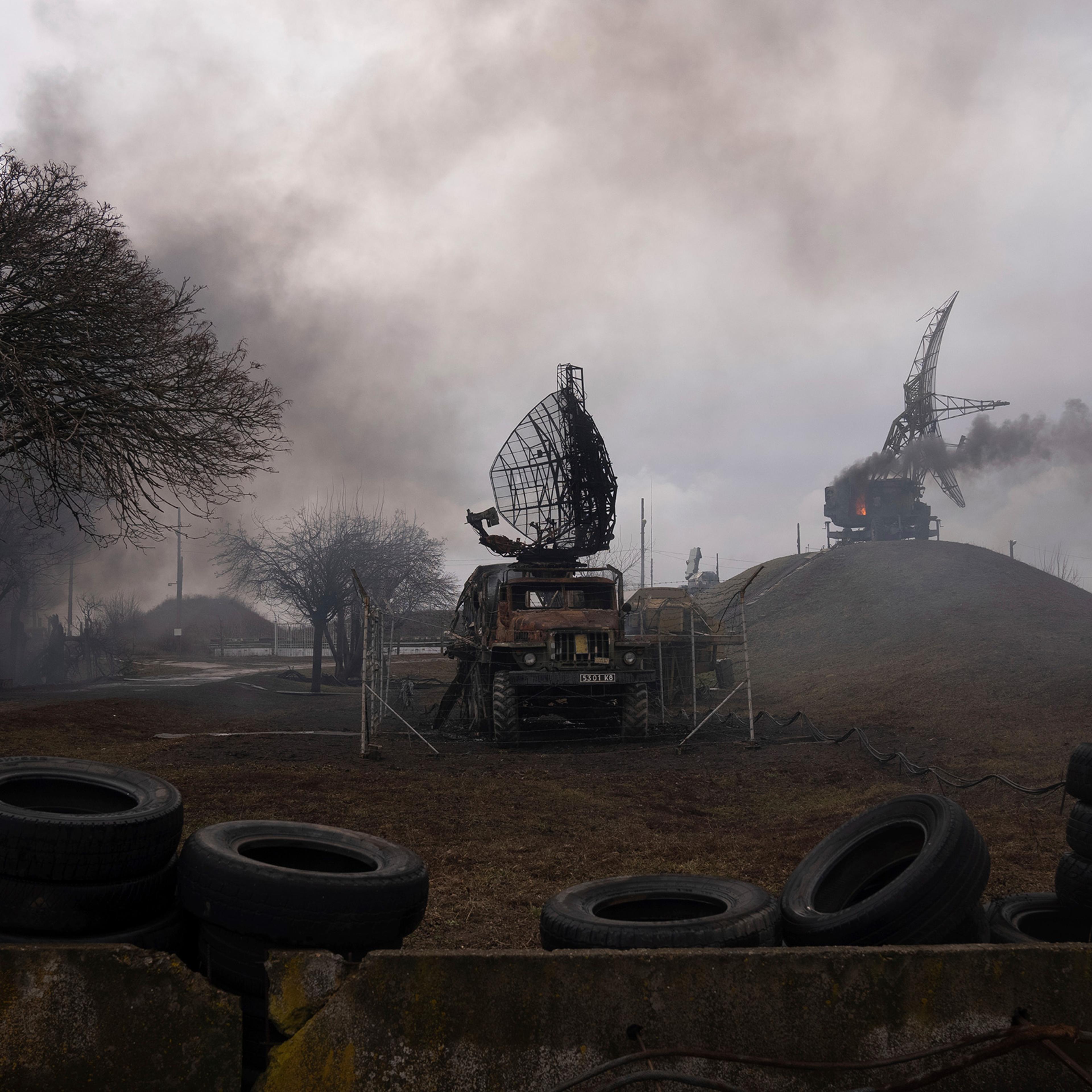 Smoke rises from an air defense base in the aftermath of a Russian strike in Mariupol, Ukraine on Feb. 24.