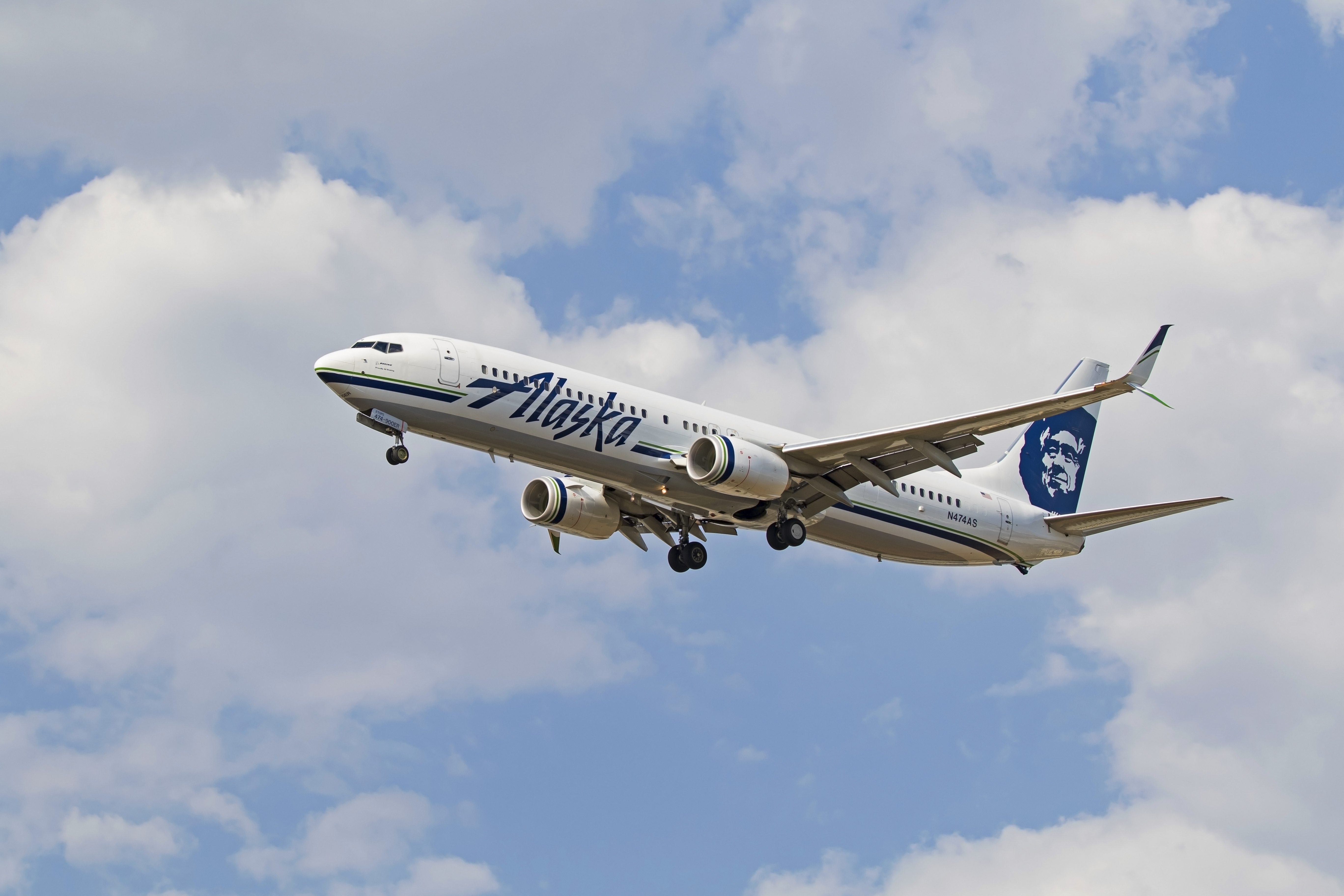 Airplane Alaska Airlines 737-900ER passenger jet landing