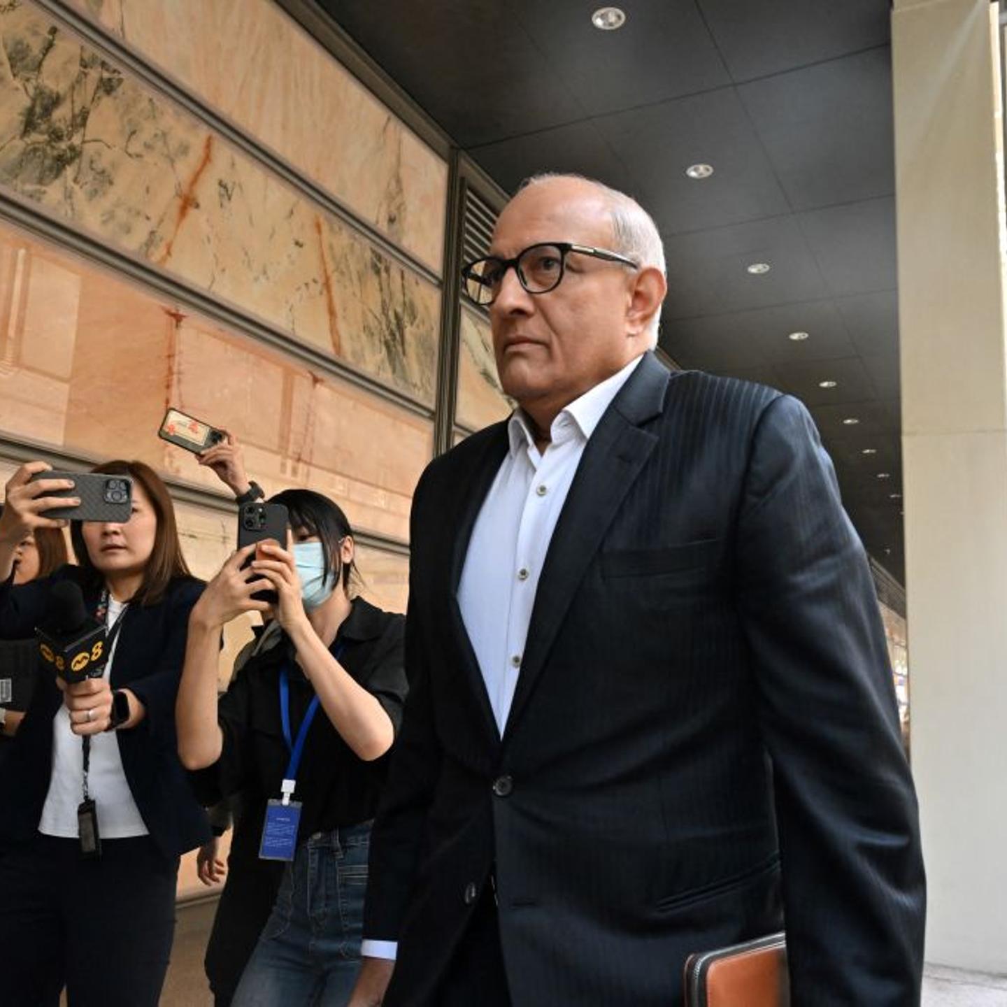 Singapore's former Minister for Transport and Minister-in-charge for Trade Relations S. Iswaran arrives at the Supreme Court in Singapore on Sept. 24, 2024.