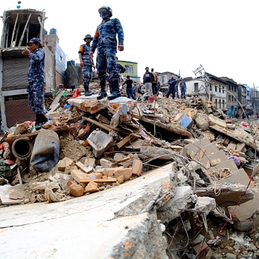 Search and rescue team work among the debris of houses after a powerful earthquake hits Katmandu, Nepal on April 26, 2015.