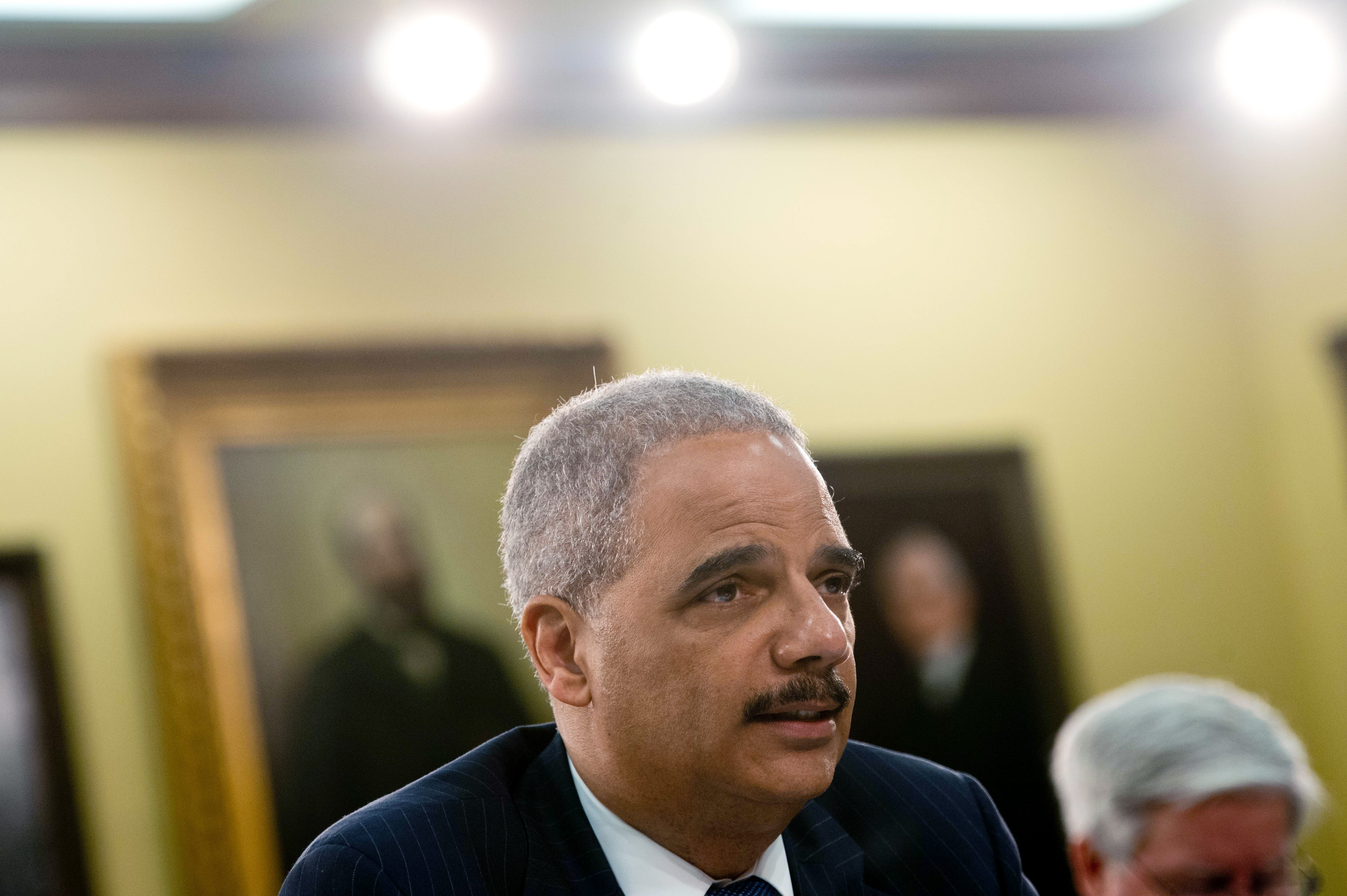 U.S. Attorney General Eric Holder testifies before a House Appropriations Committee Commerce, Justice, Science, and Related Agencies Subcommittee hearing on the Justice Department's fiscal year 2015 budget request on Capitol Hill in Washington, D.C. on A