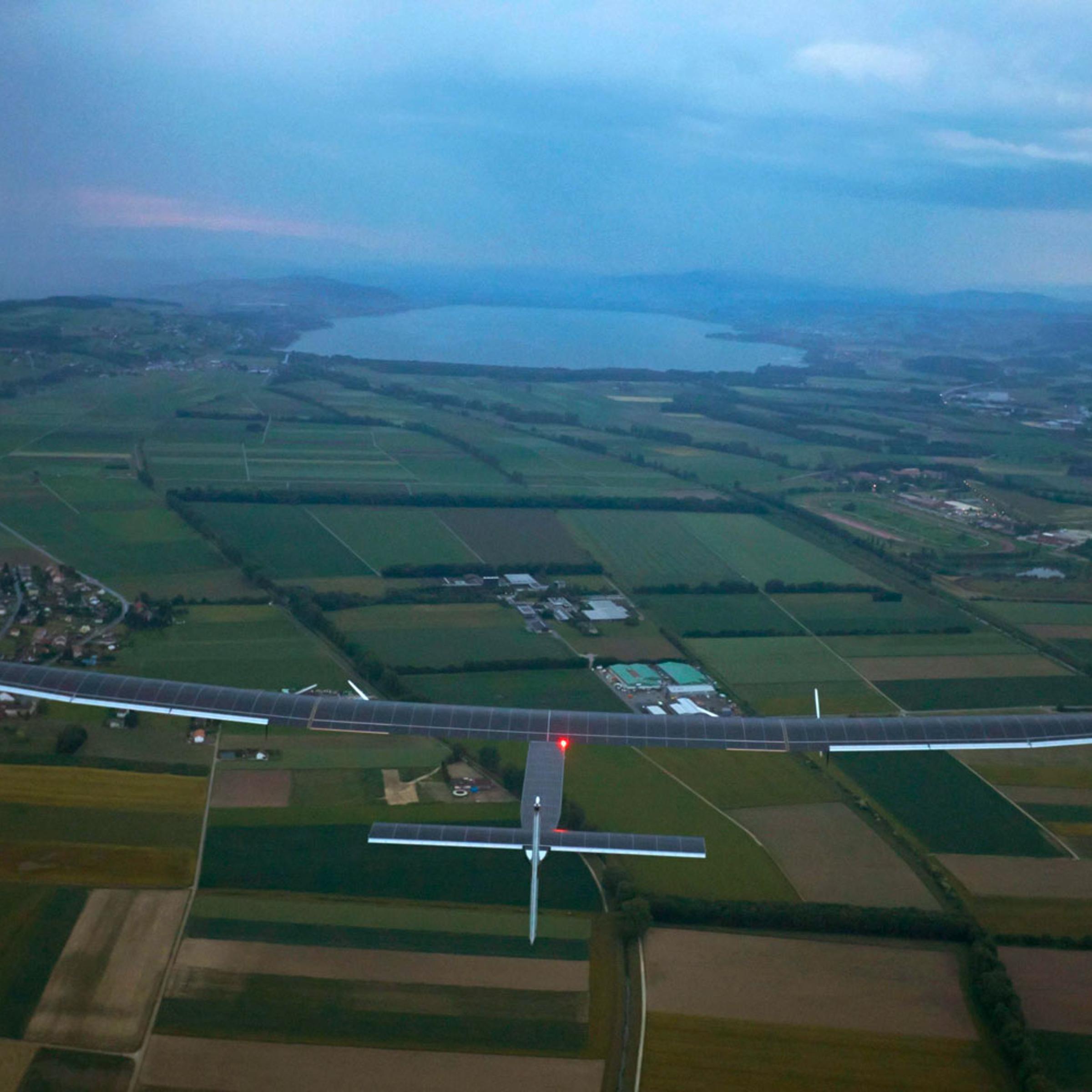 German test pilot Markus Scherdel steers Solar Impulse 2 on its maiden flight from its base in Payerne on June 2, 2014.