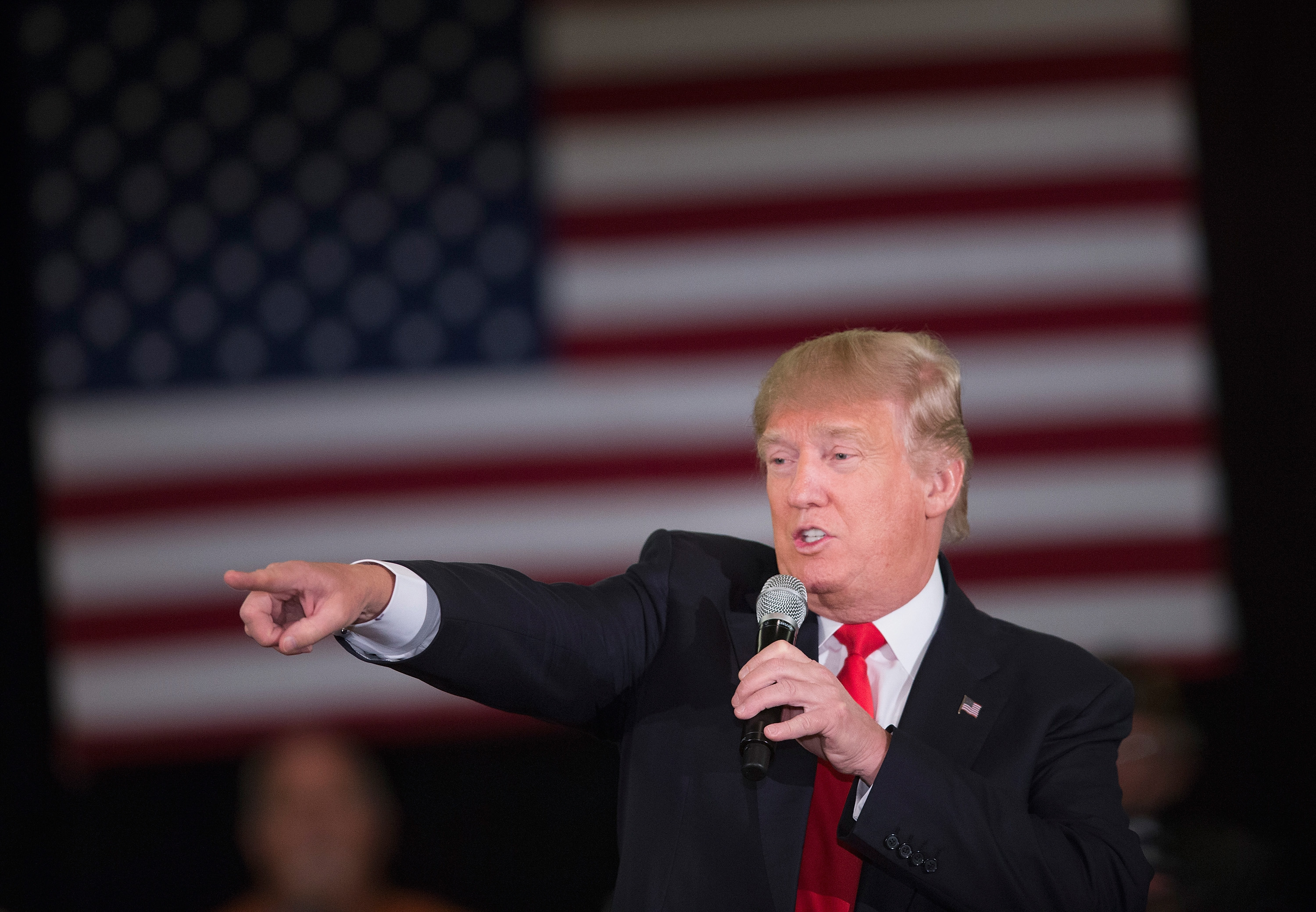 Republican presidential candidate Donald Trump speaks to guests during a campaign rally at the Radisson Paper Valley Hotel on March 30, 2016 in Appleton, Wisconsin.