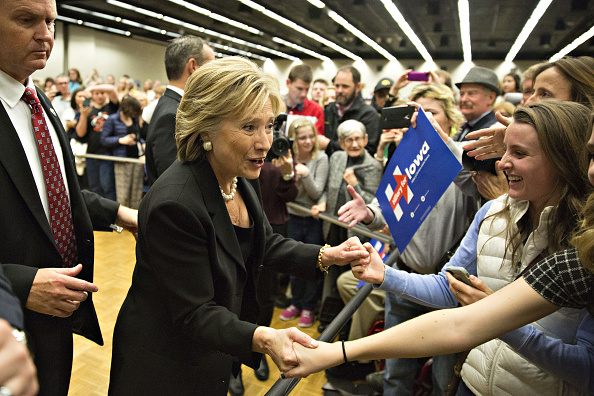 Hillary Clinton, former Secretary of State and 2016 Democratic presidential candidate, greets attendees during a rally following the Democratic presidential candidate debate at Drake University in Des Moines, Iowa, U.S., on Saturday, Nov. 14, 2015.