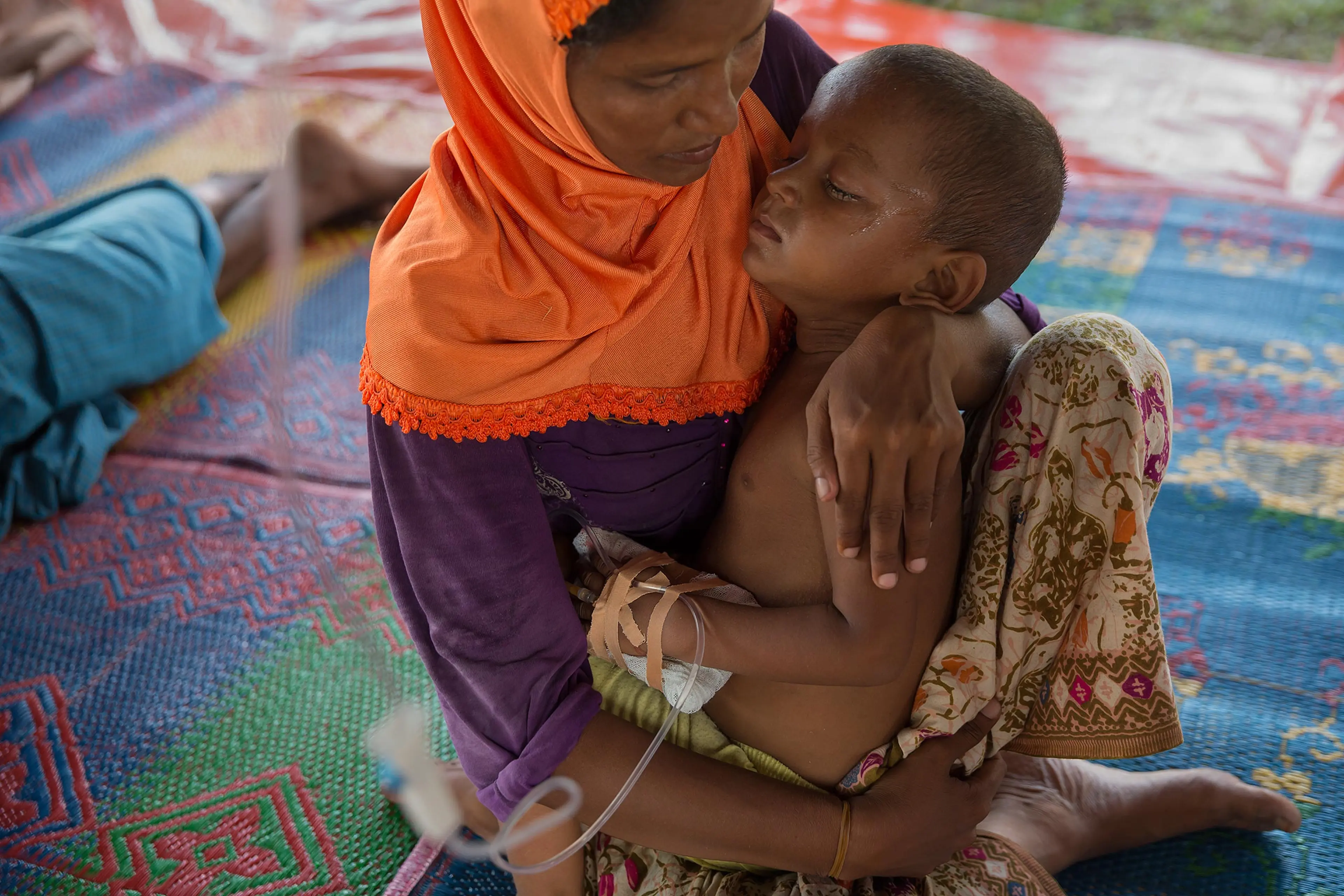 Rohingya and Bangladeshi refugees aboard boats that have been at sea for months off the coast of SE Asia. Landed in port pif Langsa in Aceh, Indonesia, where they were given shelter, food and medical care by Indonesian and international NGO's. The Rohing