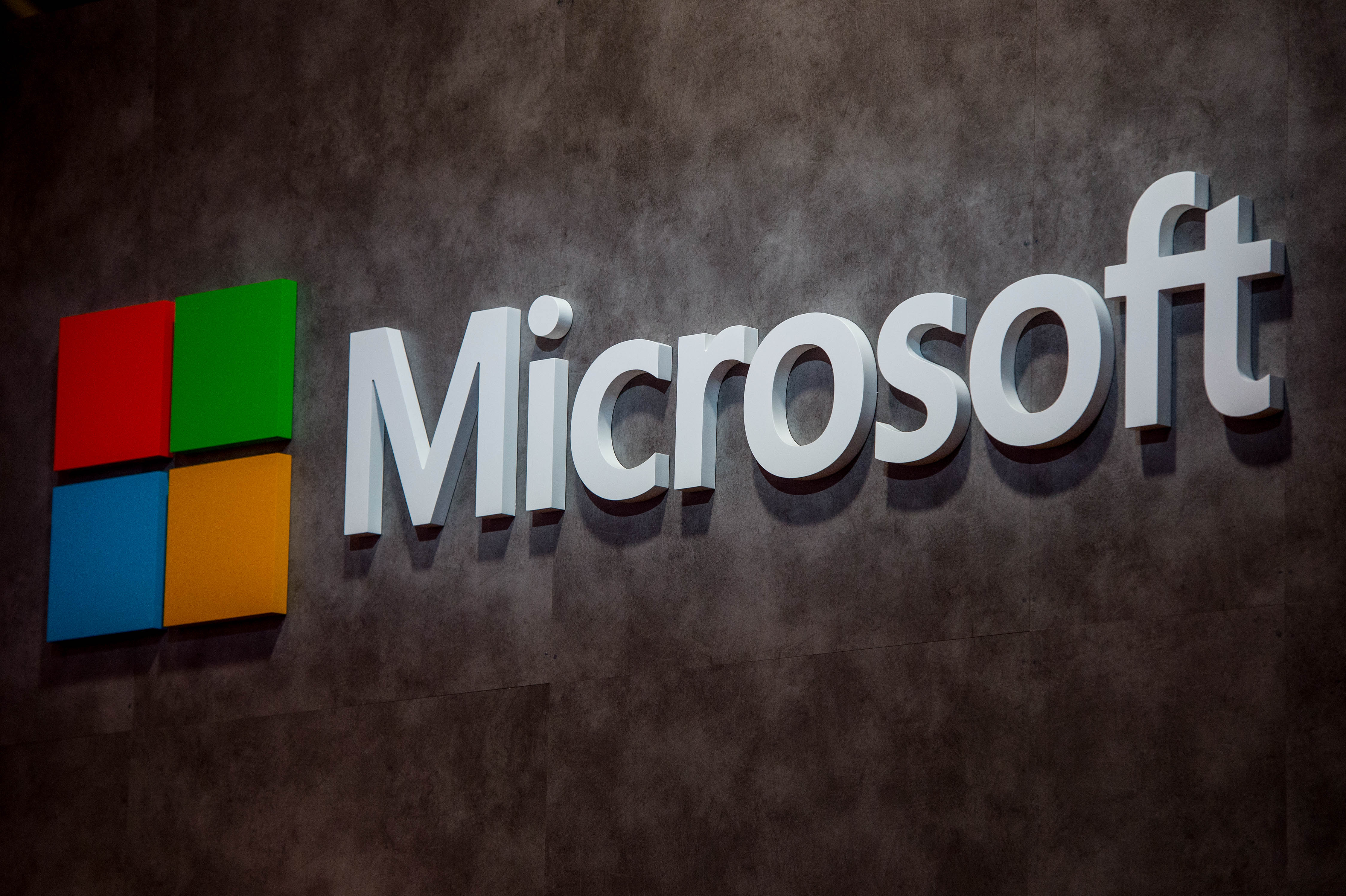 A logo sits illuminated outside the Microsoft pavilion on the opening day of the World Mobile Congress at the Fira Gran Via Complex on February 22, 2016 in Barcelona, Spain.