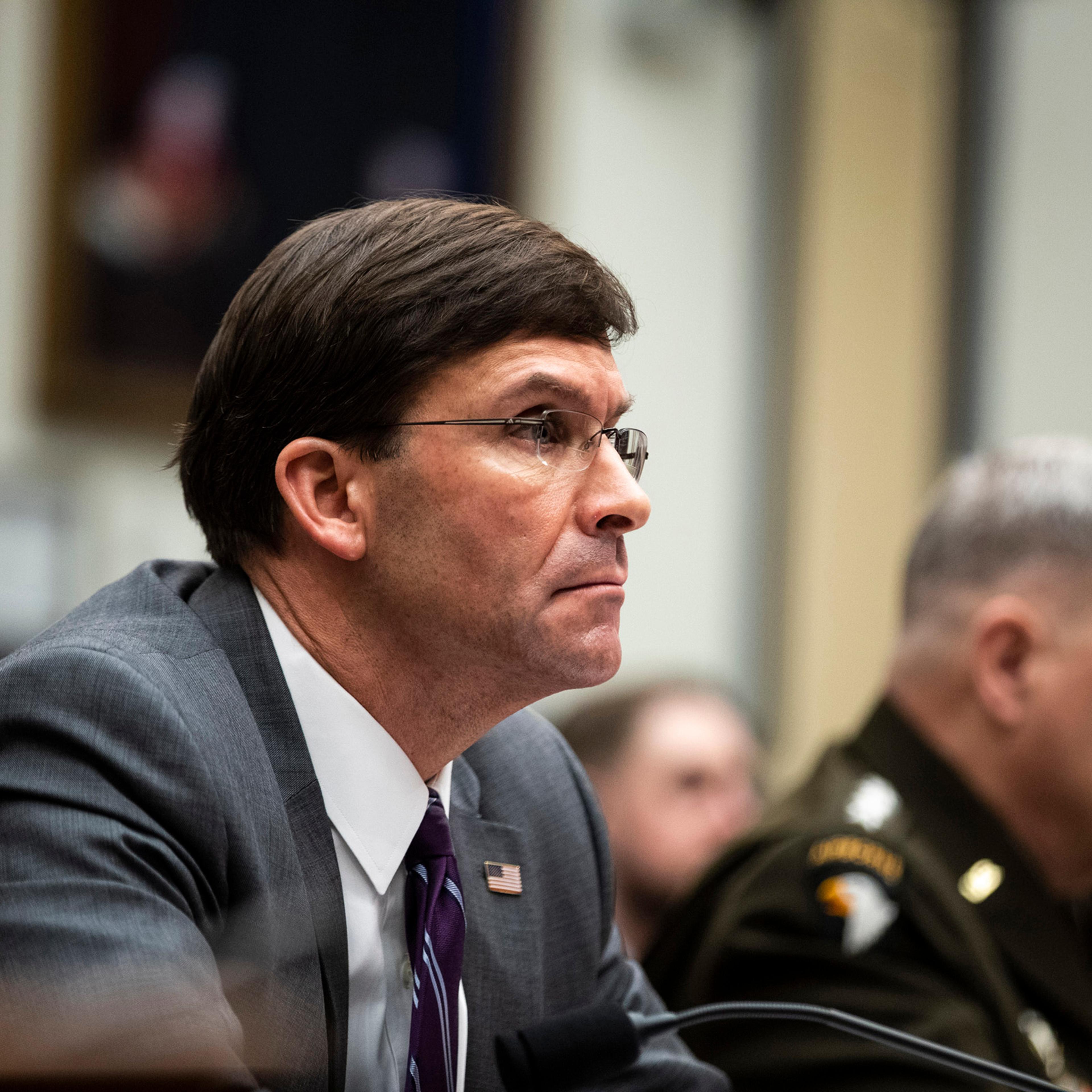 Defense Secretary Mark Esper, left, and Gen. Mark Milley, chairman of the Joint Chiefs of Staff, appear before the House Armed Services Committee in Washington on Feb. 26, 2020. (Anna Moneymaker/The New York Times)