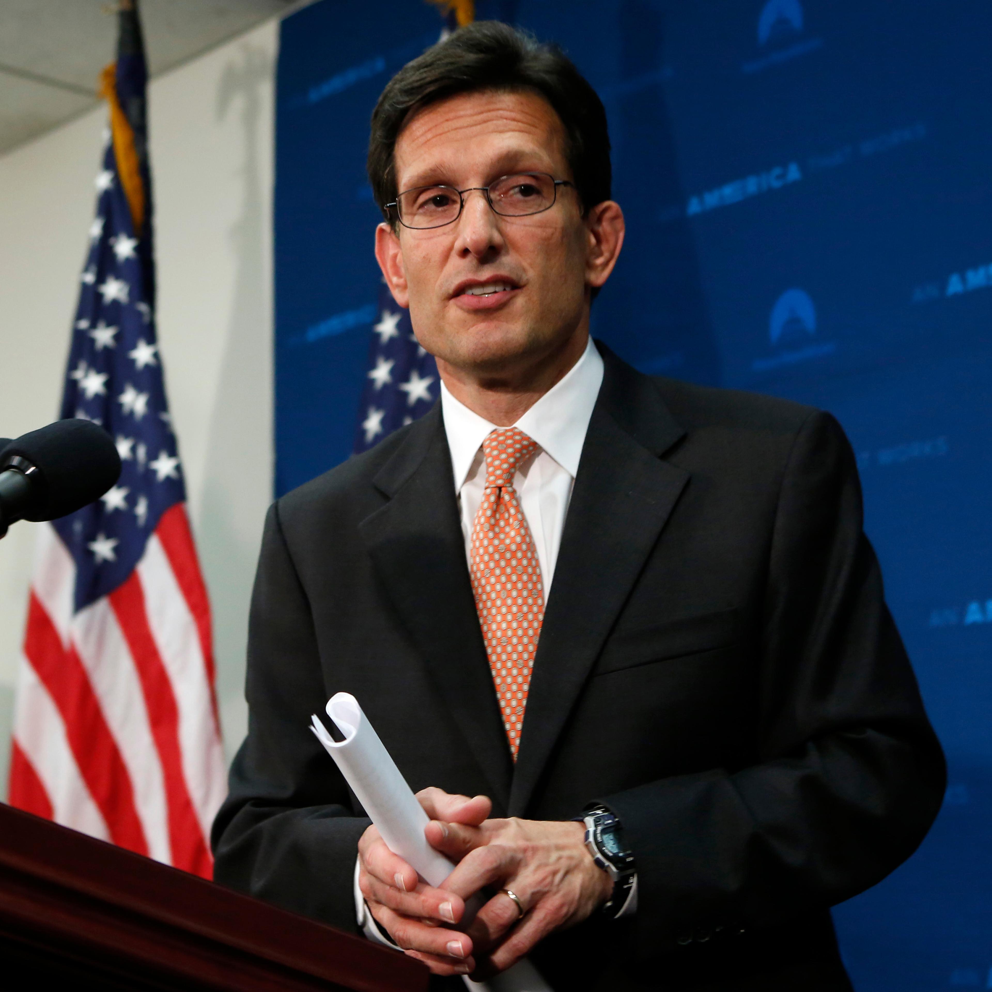 House Majority Leader Cantor leaves after a news conference