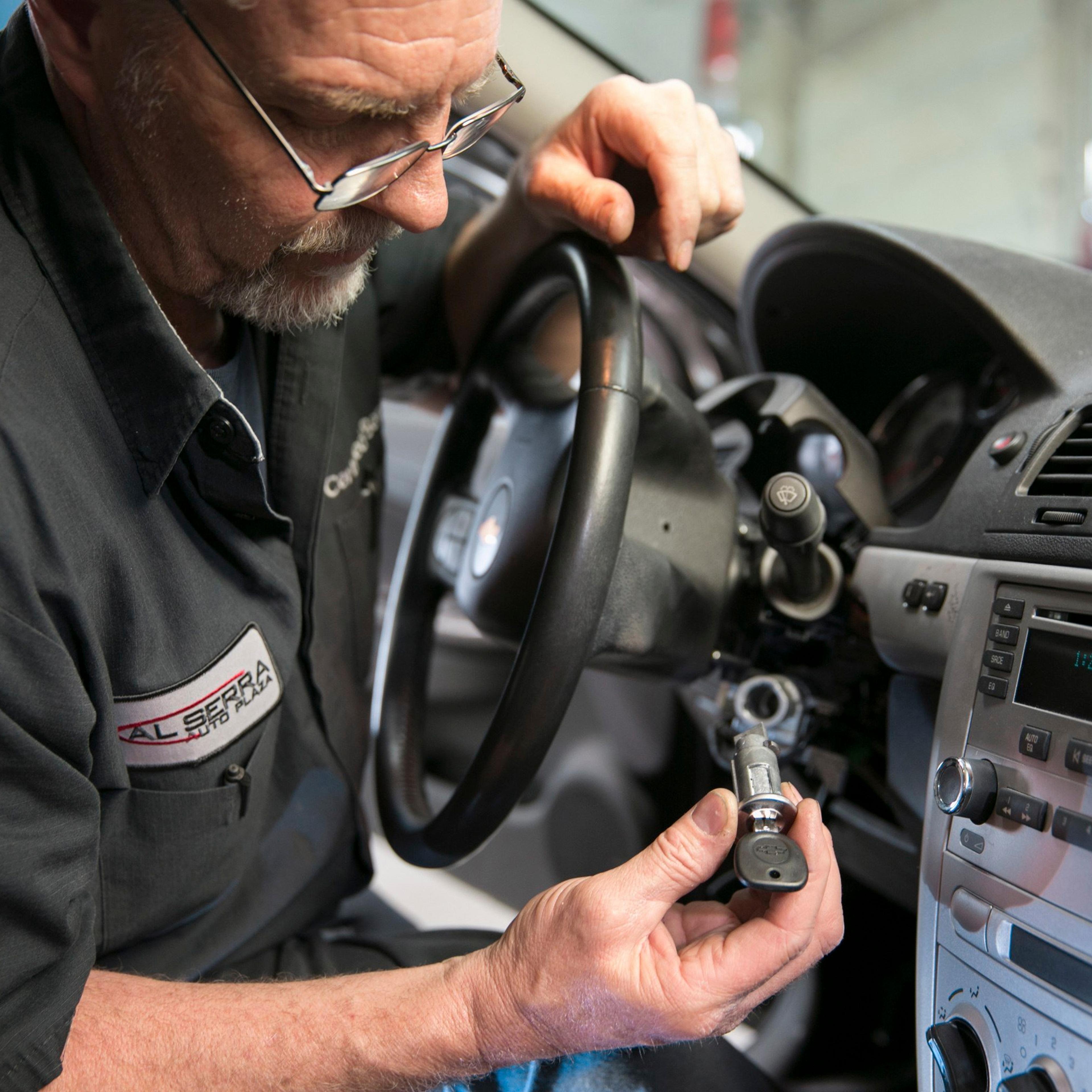 Gary Pittam performs a recall service on a Chevrolet Cobalt at Al Serra Chevrolet in Grand Blanc