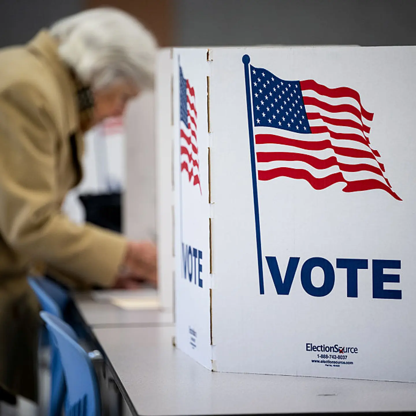 A voter casts their ballot at a polling station at Chesterbrook Elementary School in McLean, Virginia, on Nov. 4, 2025.