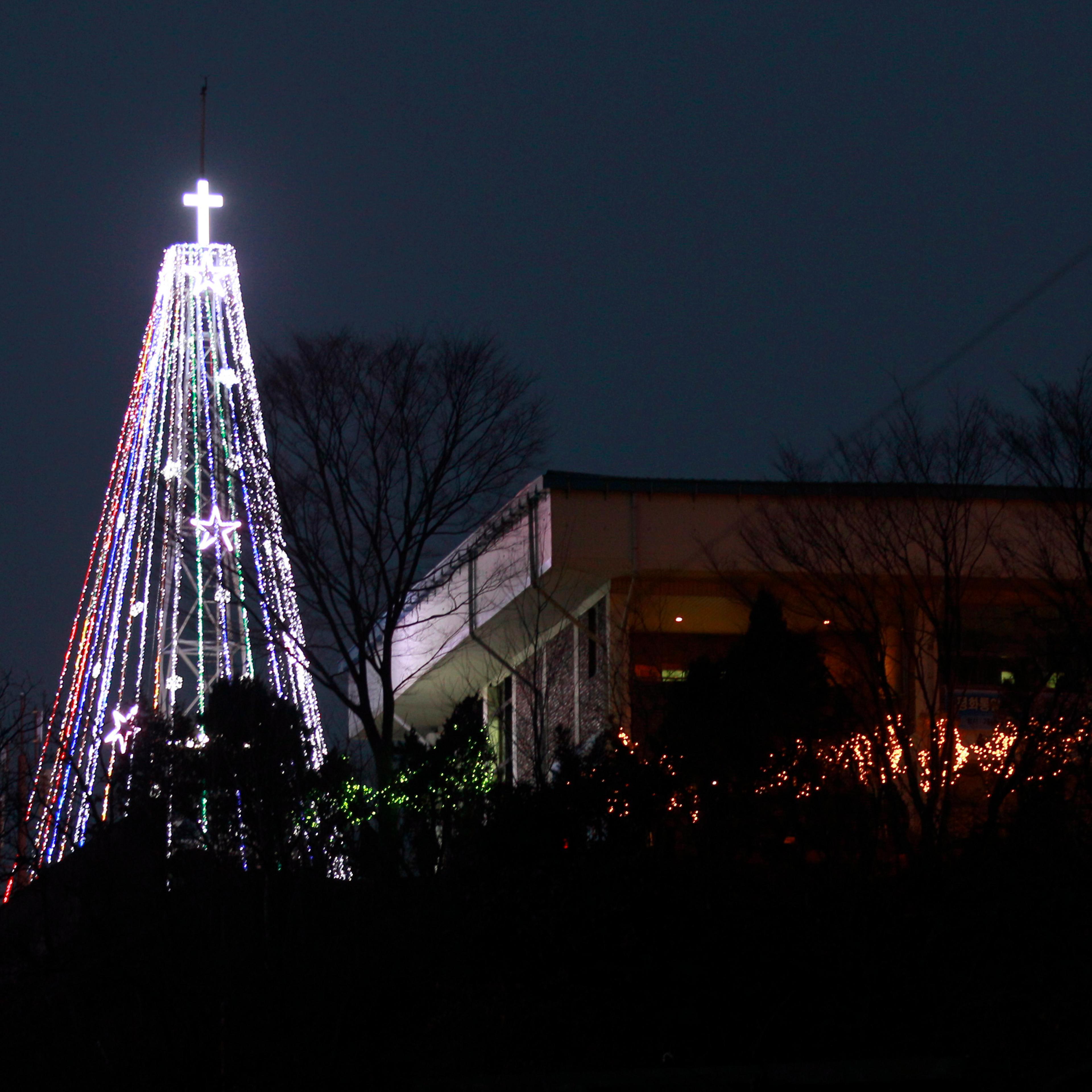 A giant steel Christmas tree lit up at the western mountain peak known as Aegibong in Gimpo, South Korea on Dec. 21, 2010.