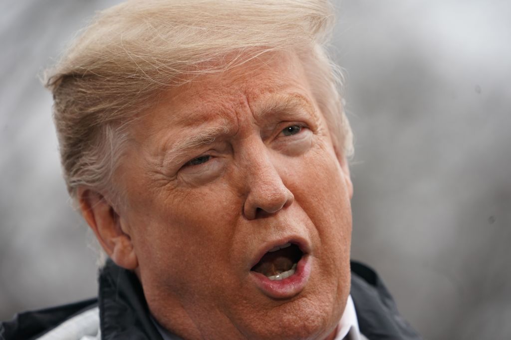 US President Donald Trump speaks to the press before boarding Marine One