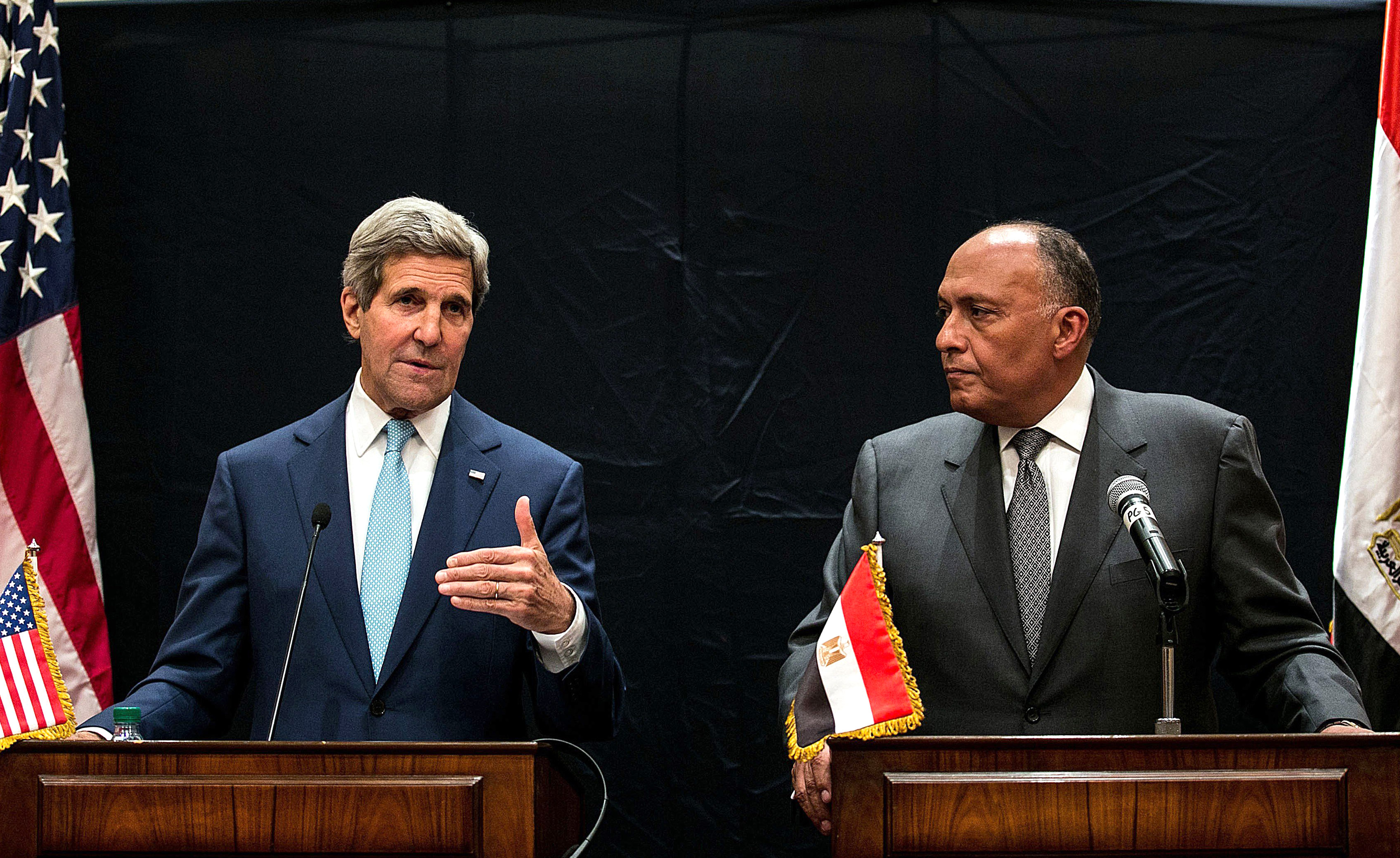 US Secretary of State John Kerry (L) and Egypt's Foreign Minister Sameh Hassan Shoukry hold a joint press conference regarding developments in Syria and Iraq on June 22, 2014 in Cairo.