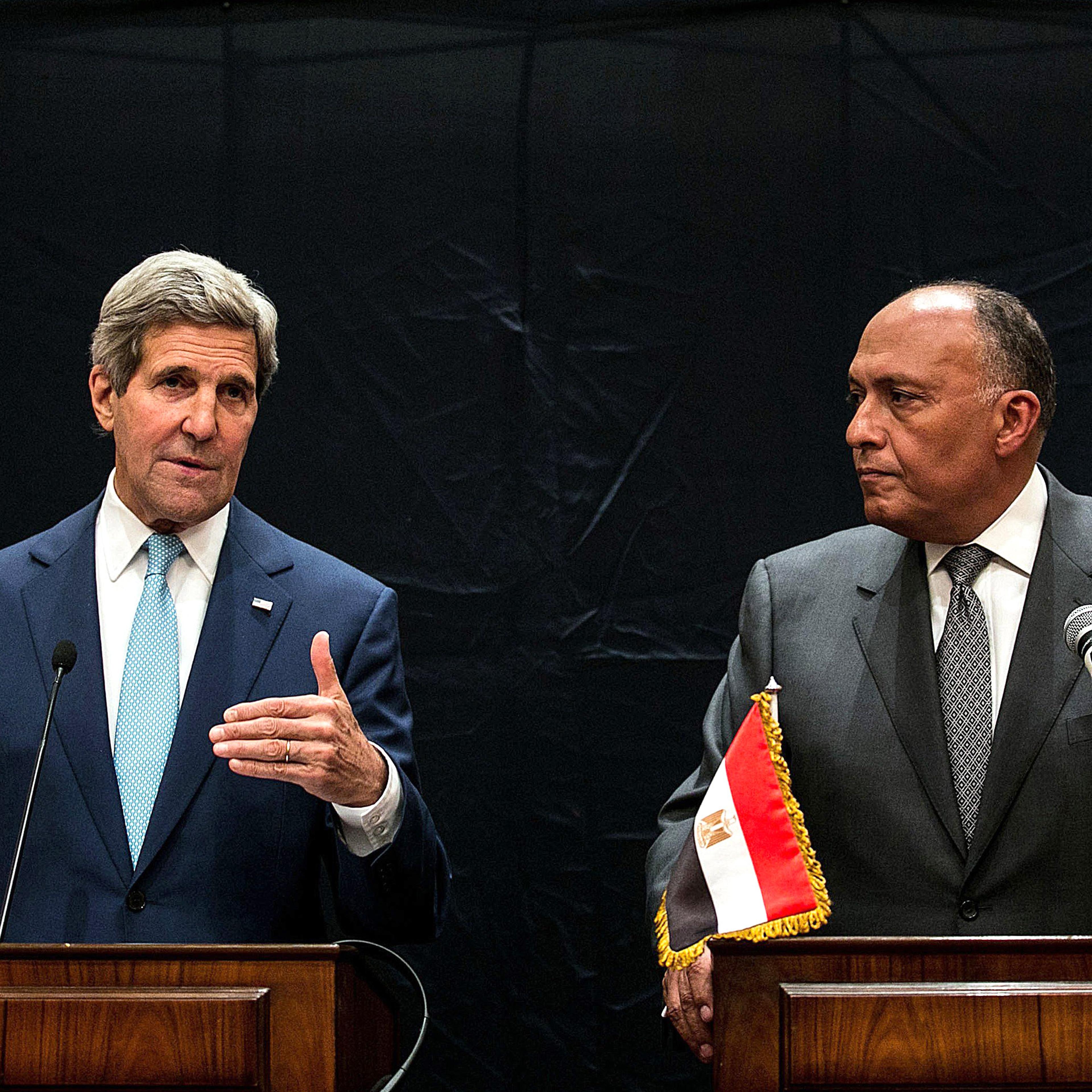 US Secretary of State John Kerry (L) and Egypt's Foreign Minister Sameh Hassan Shoukry hold a joint press conference regarding developments in Syria and Iraq on June 22, 2014 in Cairo.