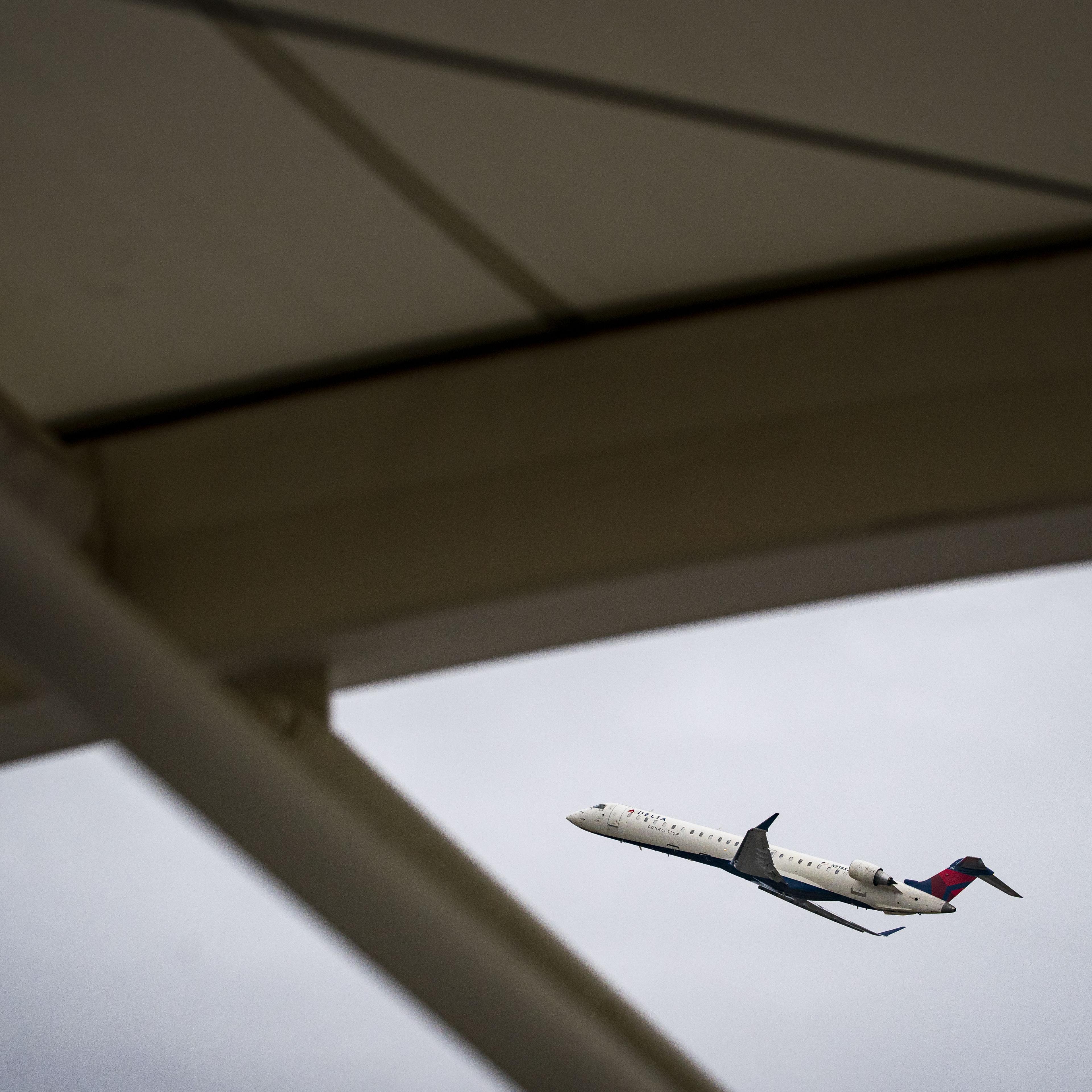 A Delta Air Lines plane departs Raleigh-Durham International Airport (RDU) in Morrisville, NC, on Jan. 20, 2022.