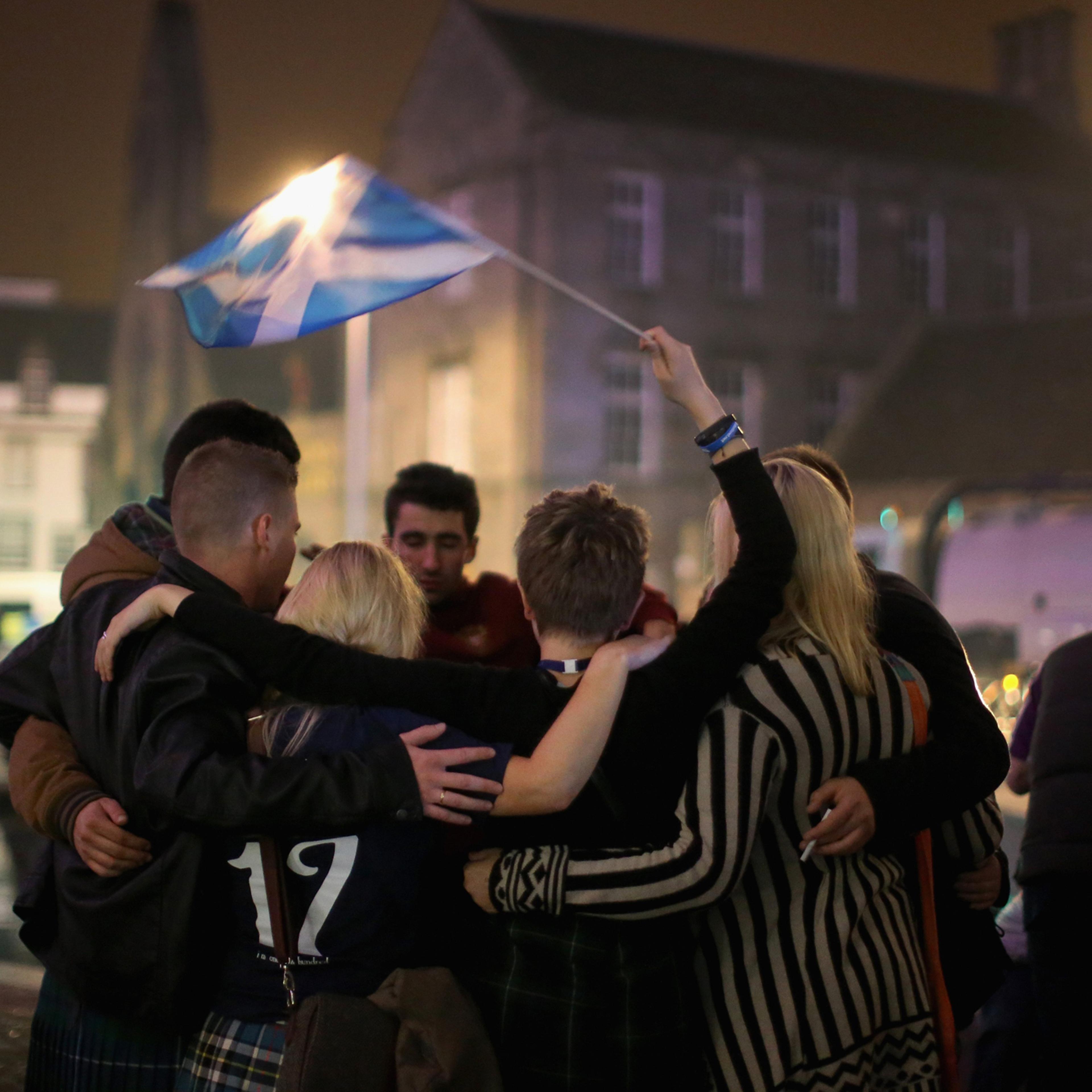 Yes vote campaigners console themselves outside the Scottish Parliament building after the people of Scotland voted no to independence on Sept. 19, 2014 in Edinburgh, Scotland.
