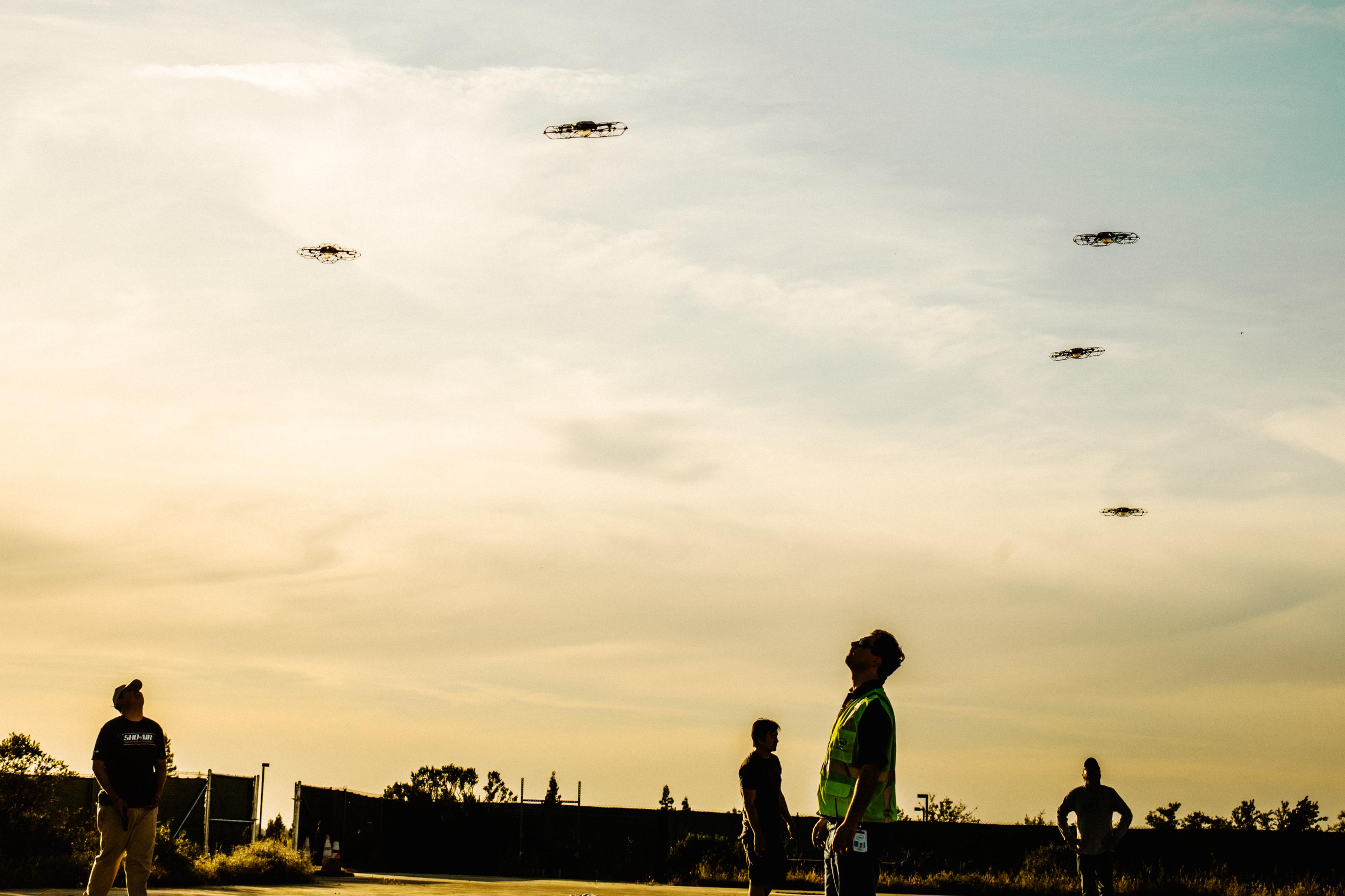 Members of the Intel Shooting Star team test a few of their drones before a cover animation attempt on May 3, 2018 in Folsom, Calif.