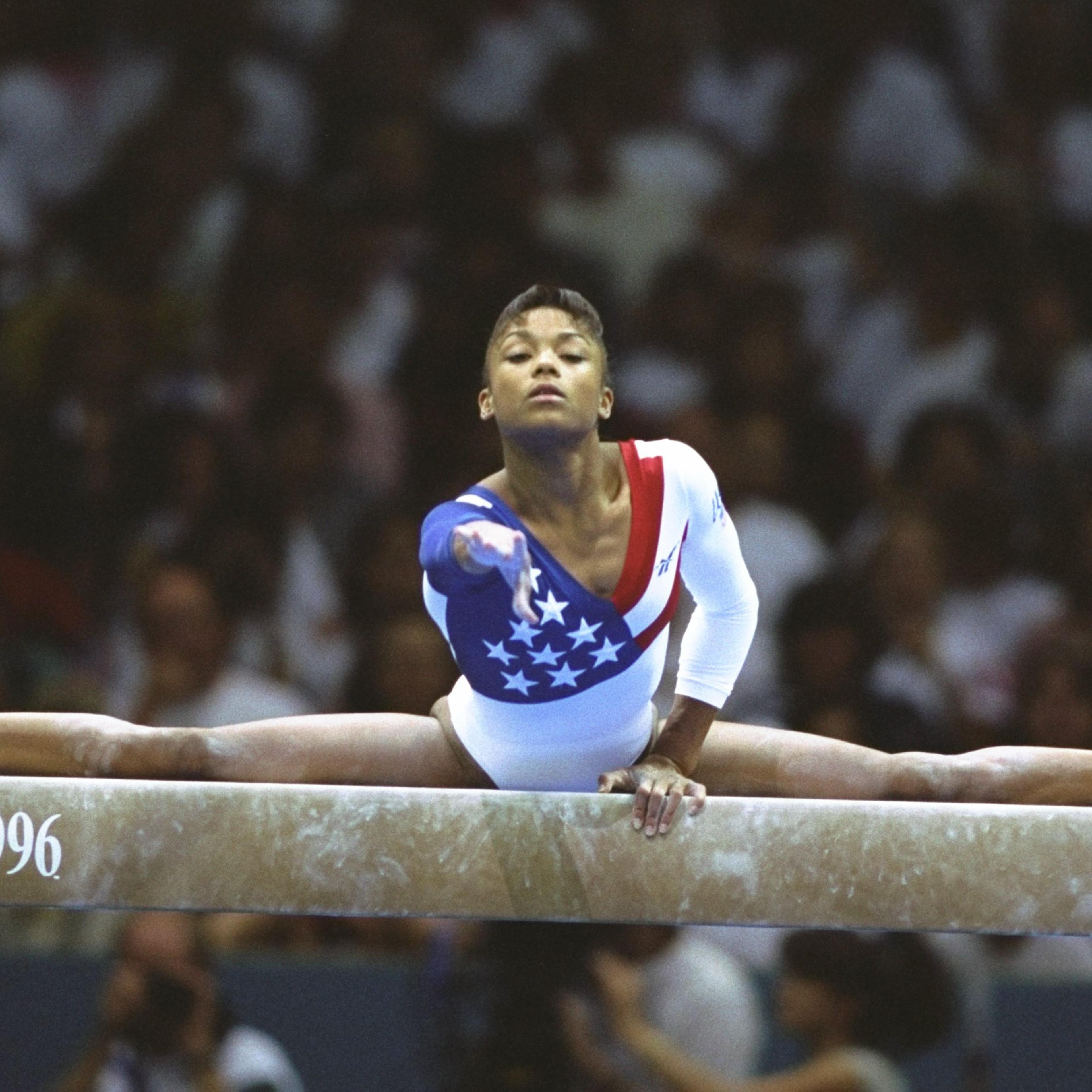 Dominique Dawes of the USA on the beam during the womens team gymnastics event at the Georgia Dome at the 1996 Centennial Olympic Games in Atlanta on July 23, 1996.