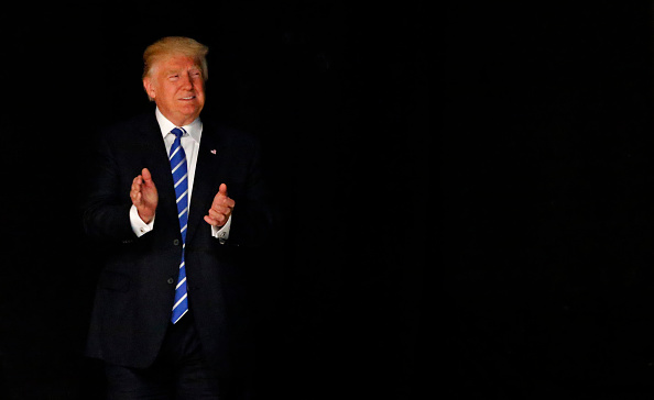 DALLAS, TX - JUNE 16: Republican presidential candidate Donald Trump arrives on stage June 16, 2016 at Gilley's in Dallas, Texas. Trump arrived in Texas on Thursday with plans to hold rallies and fundraisers. (Photo by Ron Jenkins/Getty Images)