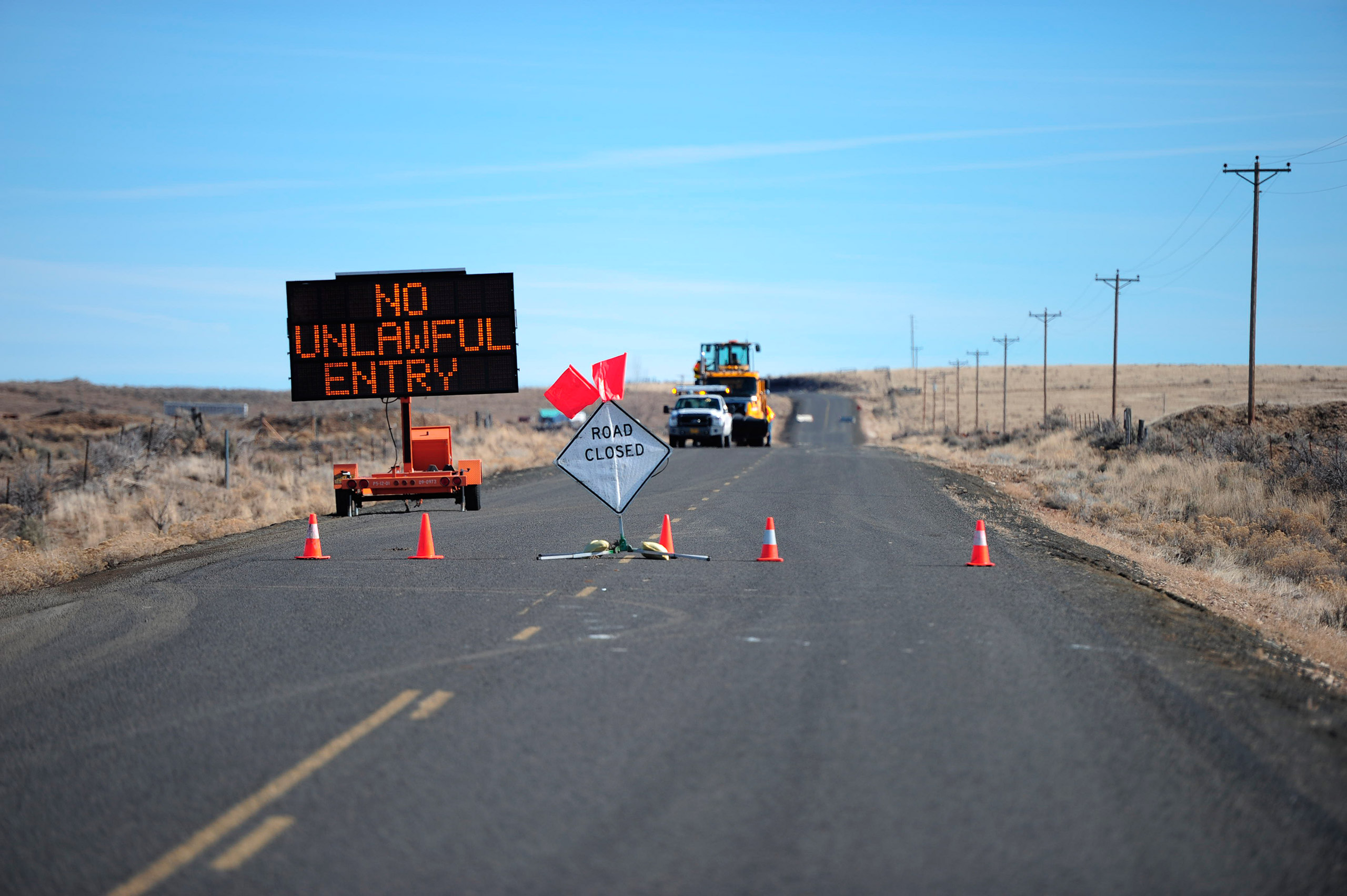 A sign at a road closure near an FBI and police checkpoint leading into the Malheur National Wildlife Refuge headquarters near Burns, Ore., Feb. 5, 2016.