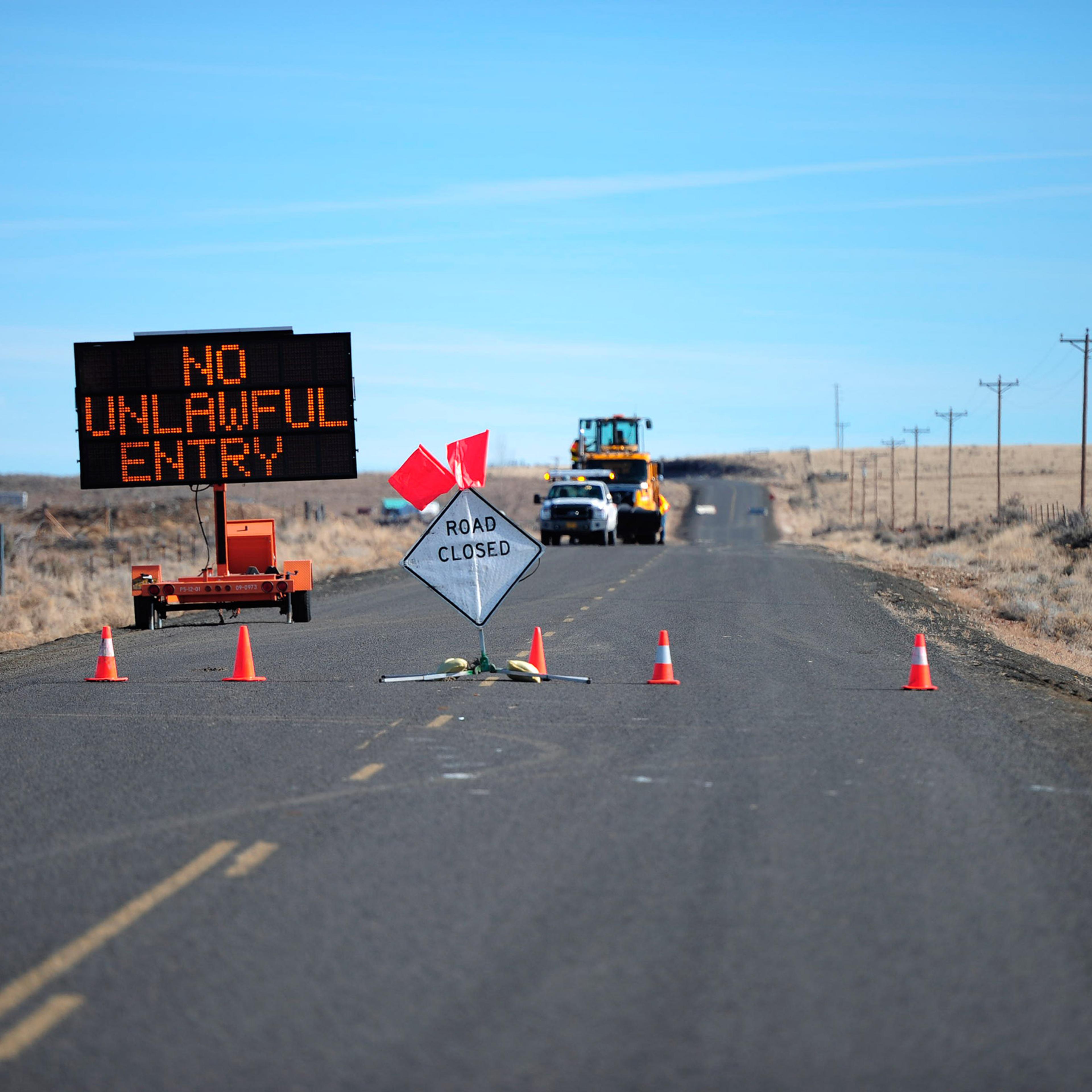 A sign at a road closure near an FBI and police checkpoint leading into the Malheur National Wildlife Refuge headquarters near Burns, Ore., Feb. 5, 2016.
