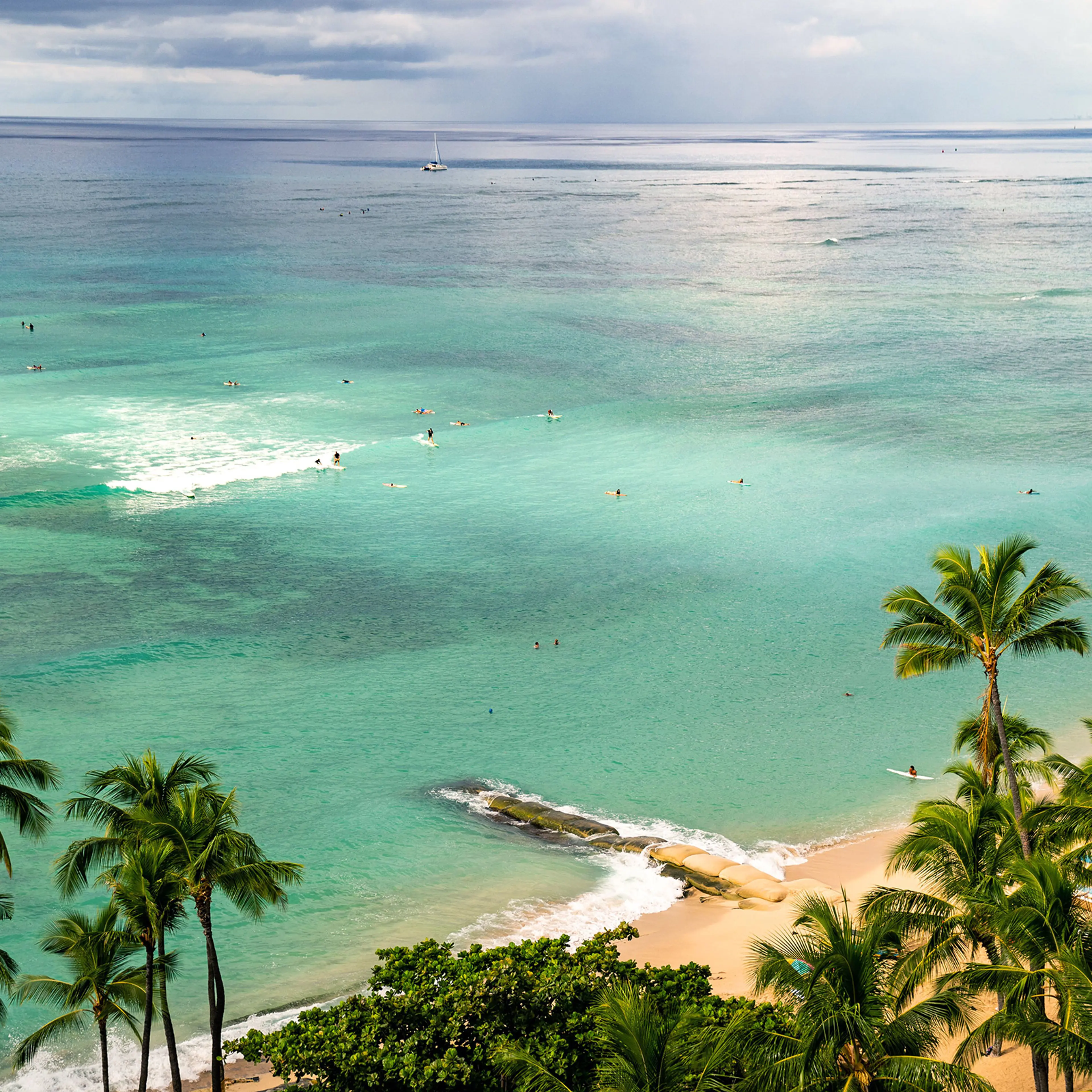 The normally packed Wakiki Beach on Oct. 22 in Honolulu. Oct. 15 was the start of a new traveler testing program, with thousands of people expected to arrive to the state