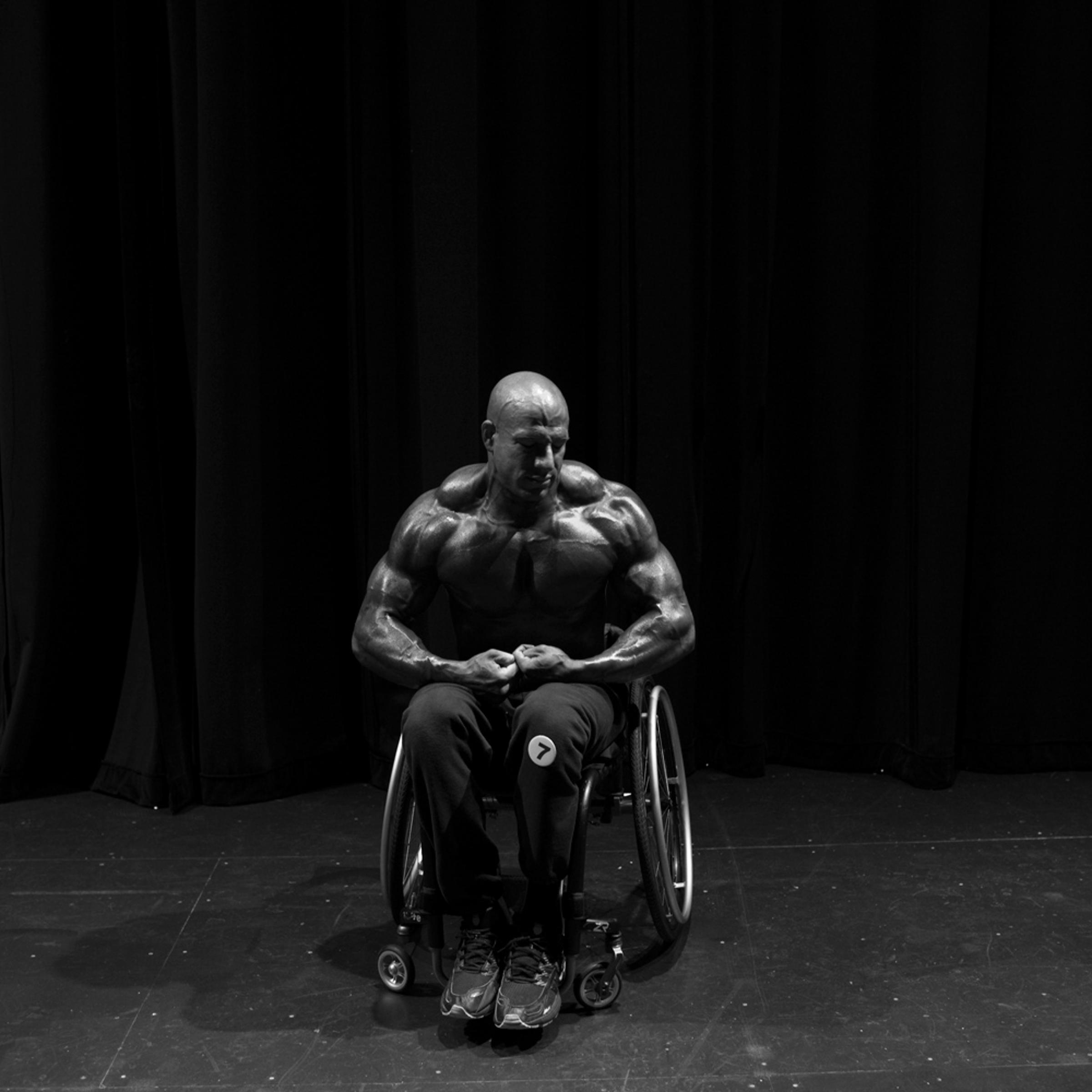 Nick Scott practices his poses backstage at the first ever Wheelchair Pro Show in Houston.
