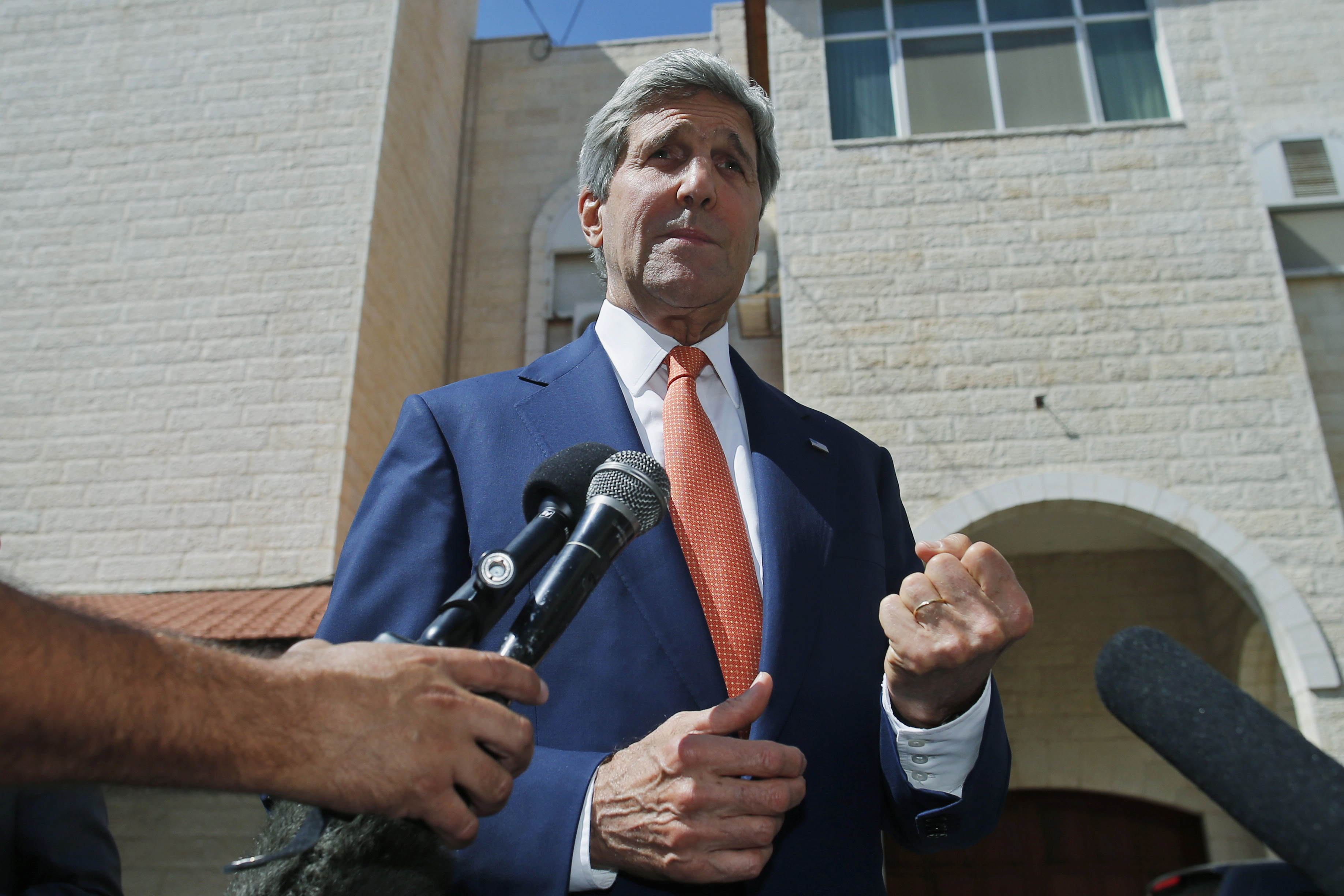 U.S. Secretary of State John Kerry speaks to reporters after meeting with Palestinian President Mahmoud Abbas in the West Bank city of Ramallah on July 23, 2014.