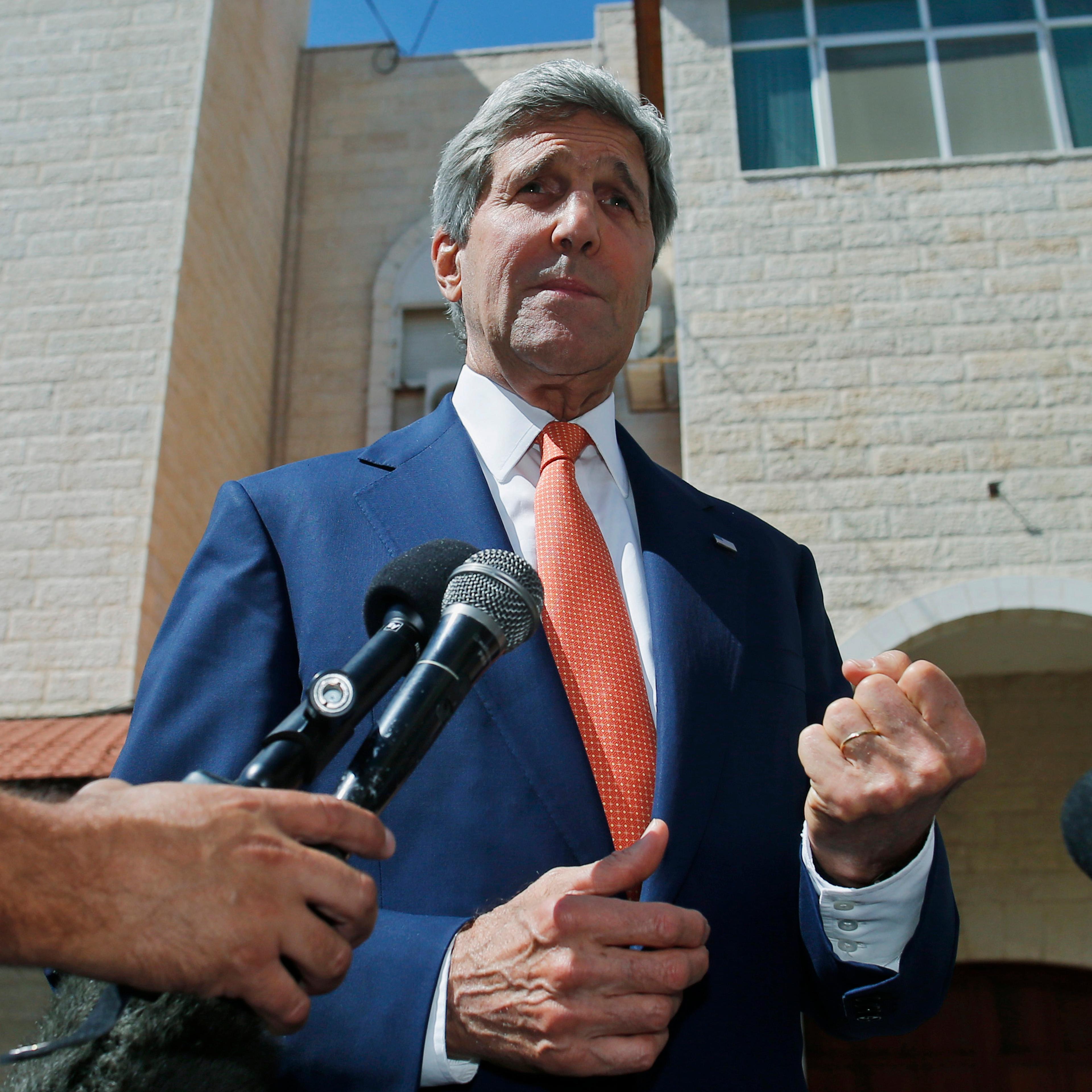 U.S. Secretary of State John Kerry speaks to reporters after meeting with Palestinian President Mahmoud Abbas in the West Bank city of Ramallah on July 23, 2014.