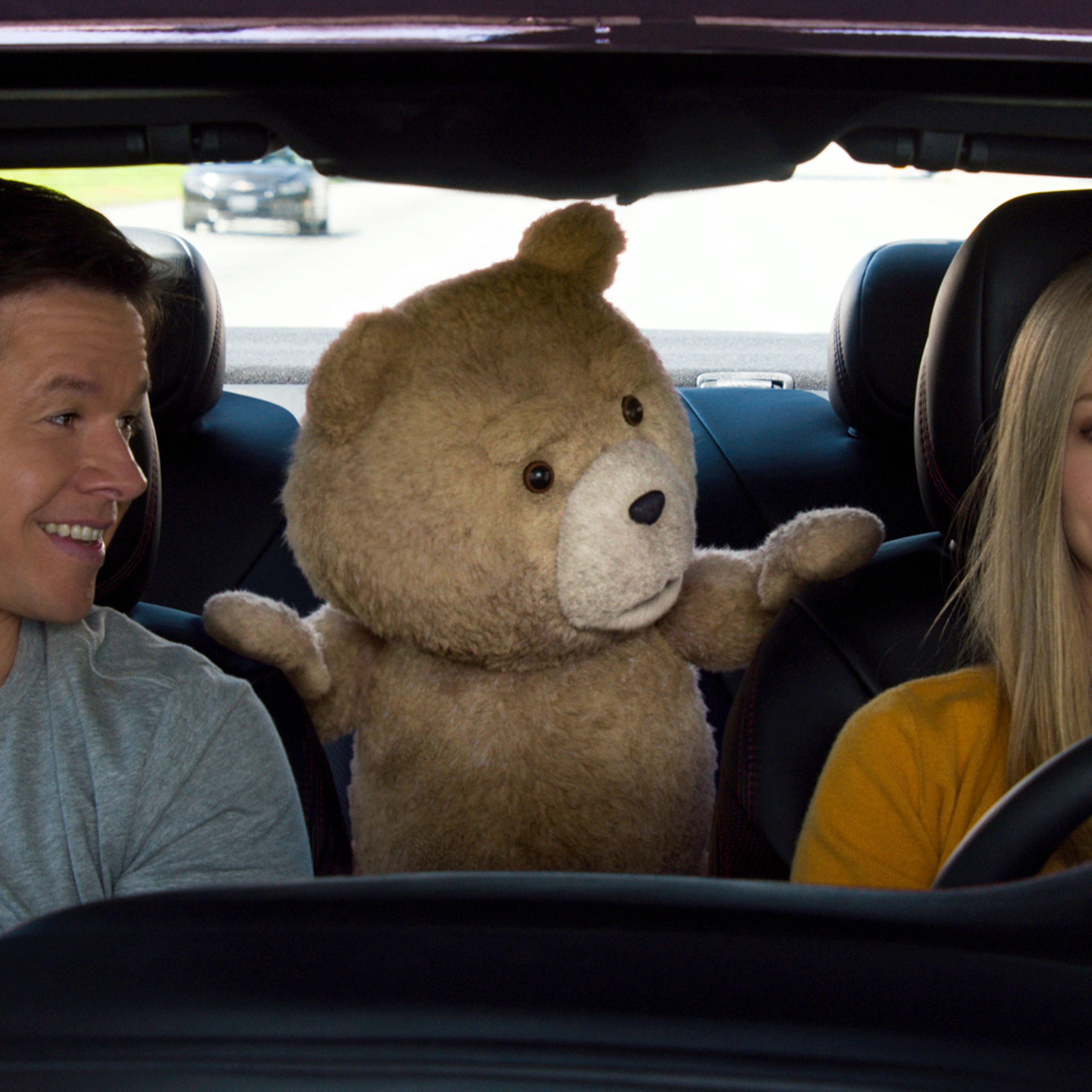 Mark Wahlberg (L) and Amanda Seyfried in a scene from "Ted 2."