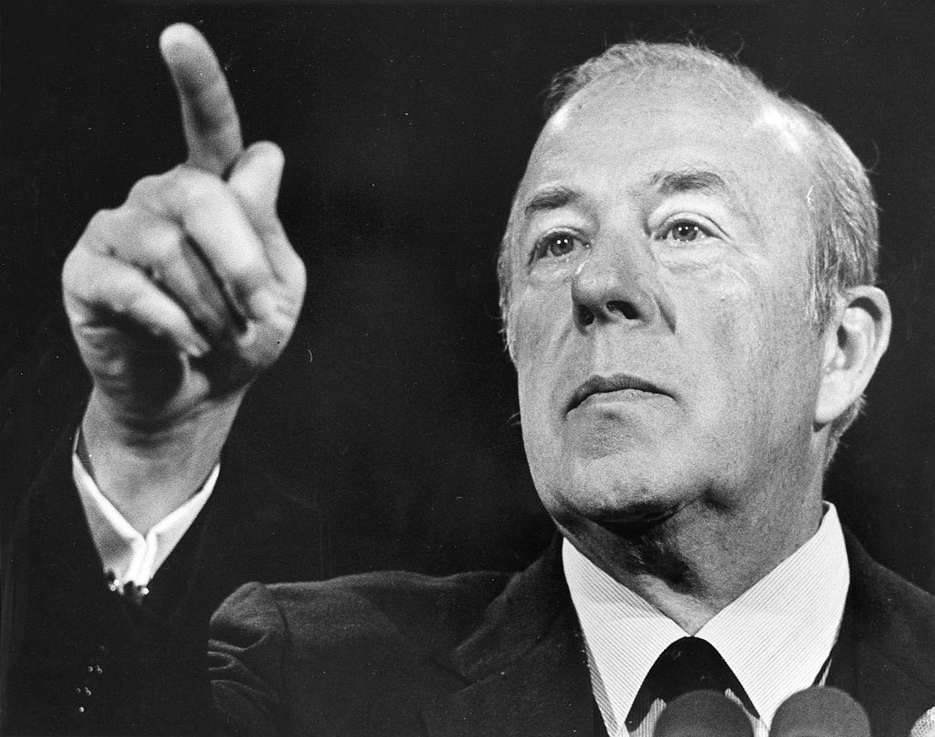 Secretary of State George Schultz speaking at a press conference