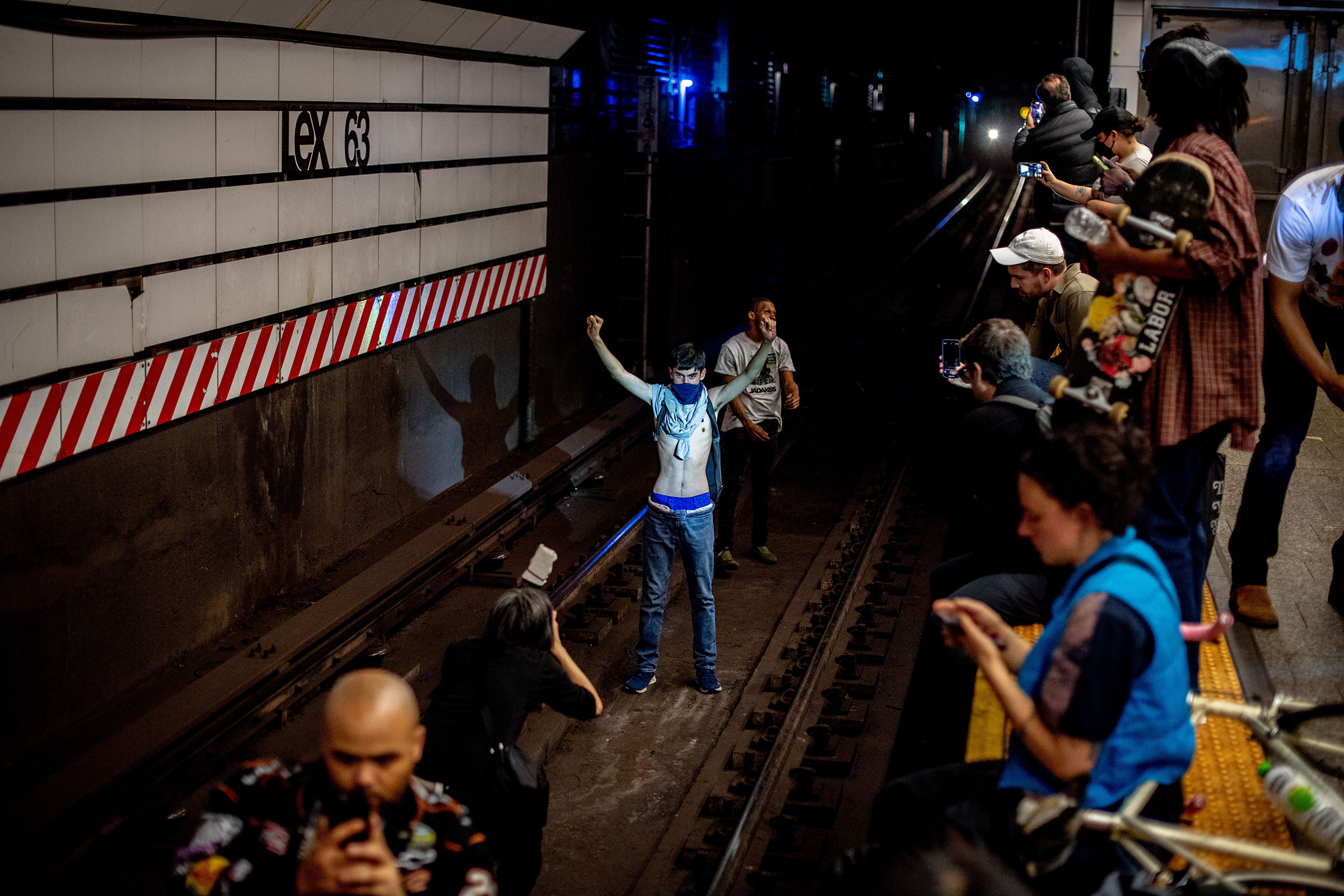 Protesters hold train traffic at Lexington and 63rd to protest the death of Jordan Neely, a popular subway performer who was killed in an incident involving a chokehold performed by a former marine, in New York, on May 6, 2023.