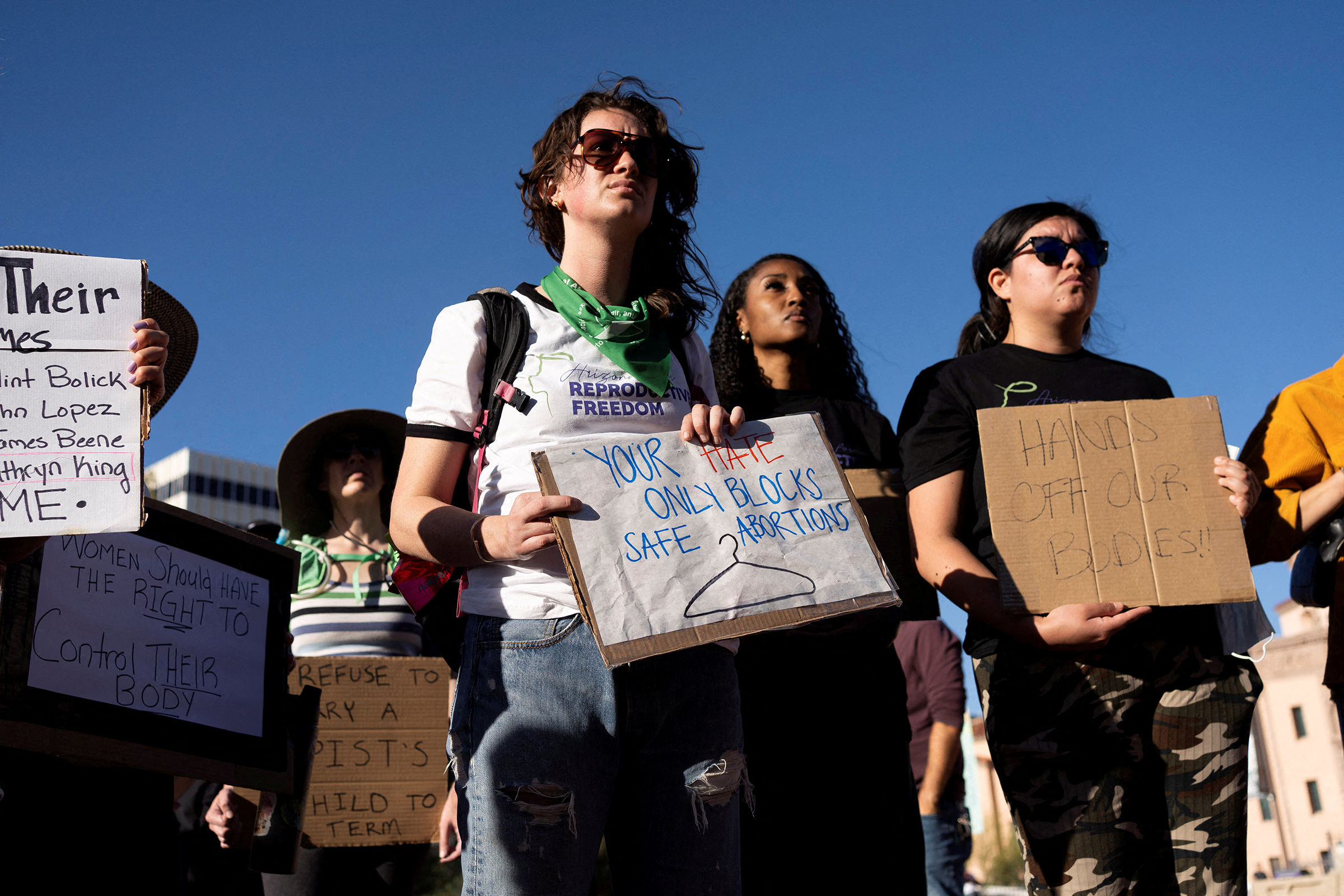 Protesters take part in a small rally led by Women's March Tucson after Arizona's Supreme Court revived a law dating to 1864 that bans abortion in virtually all instances, in Tucson, Ariz. on April 9, 2024.