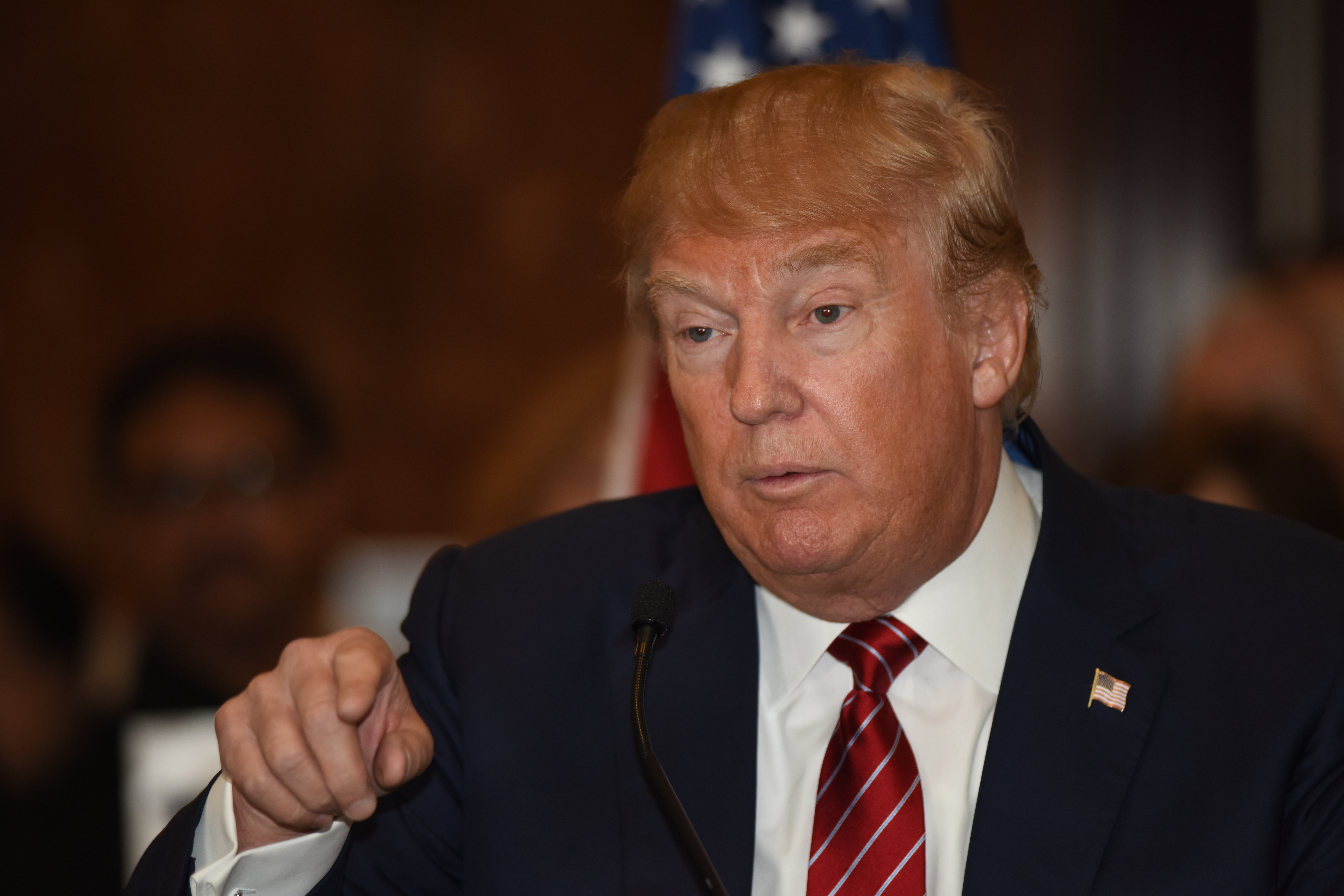 Presidential candidate Donald Trump gestures in a press conference unveiling his comprehensive tax reform plan at Trump Tower.