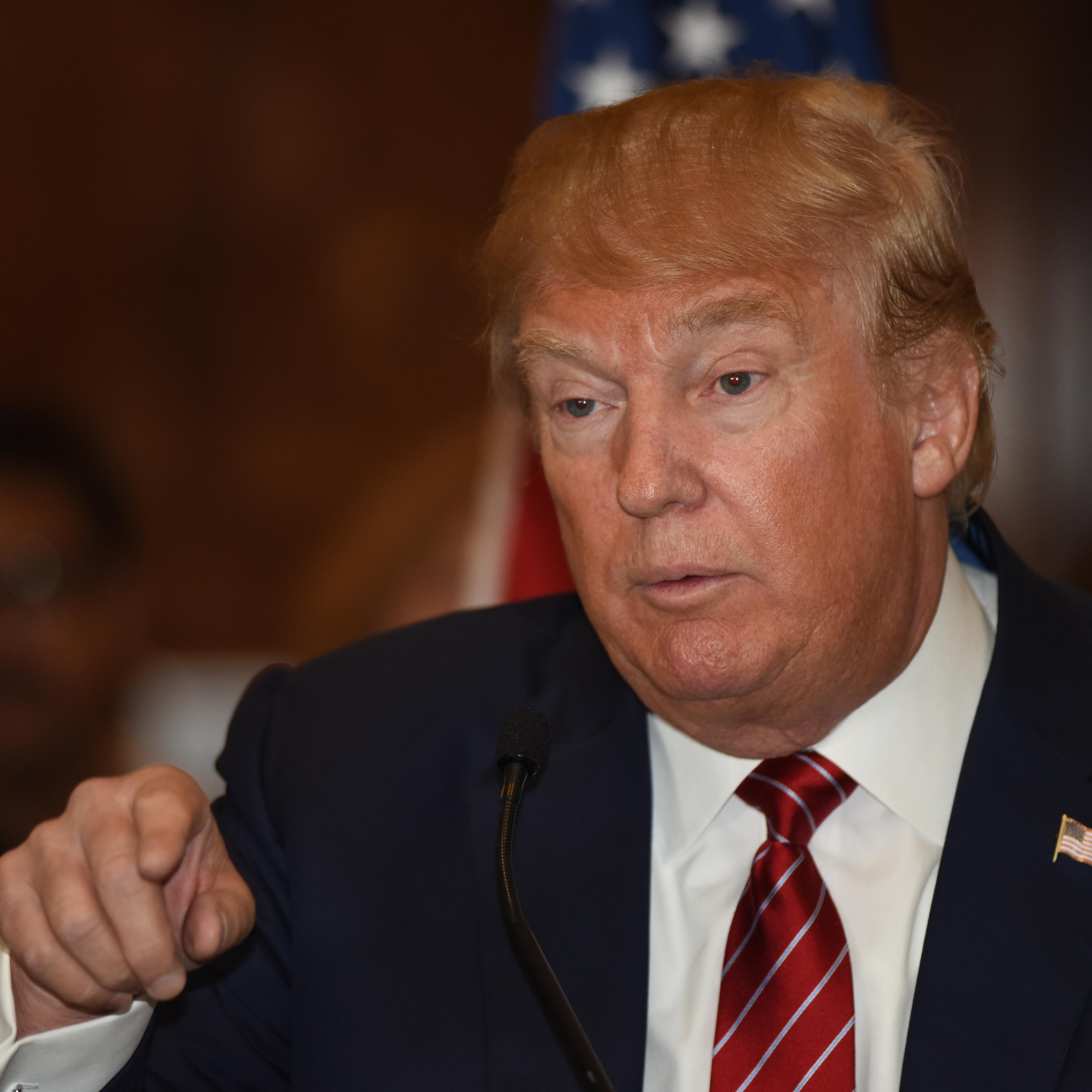 Presidential candidate Donald Trump gestures in a press conference unveiling his comprehensive tax reform plan at Trump Tower.