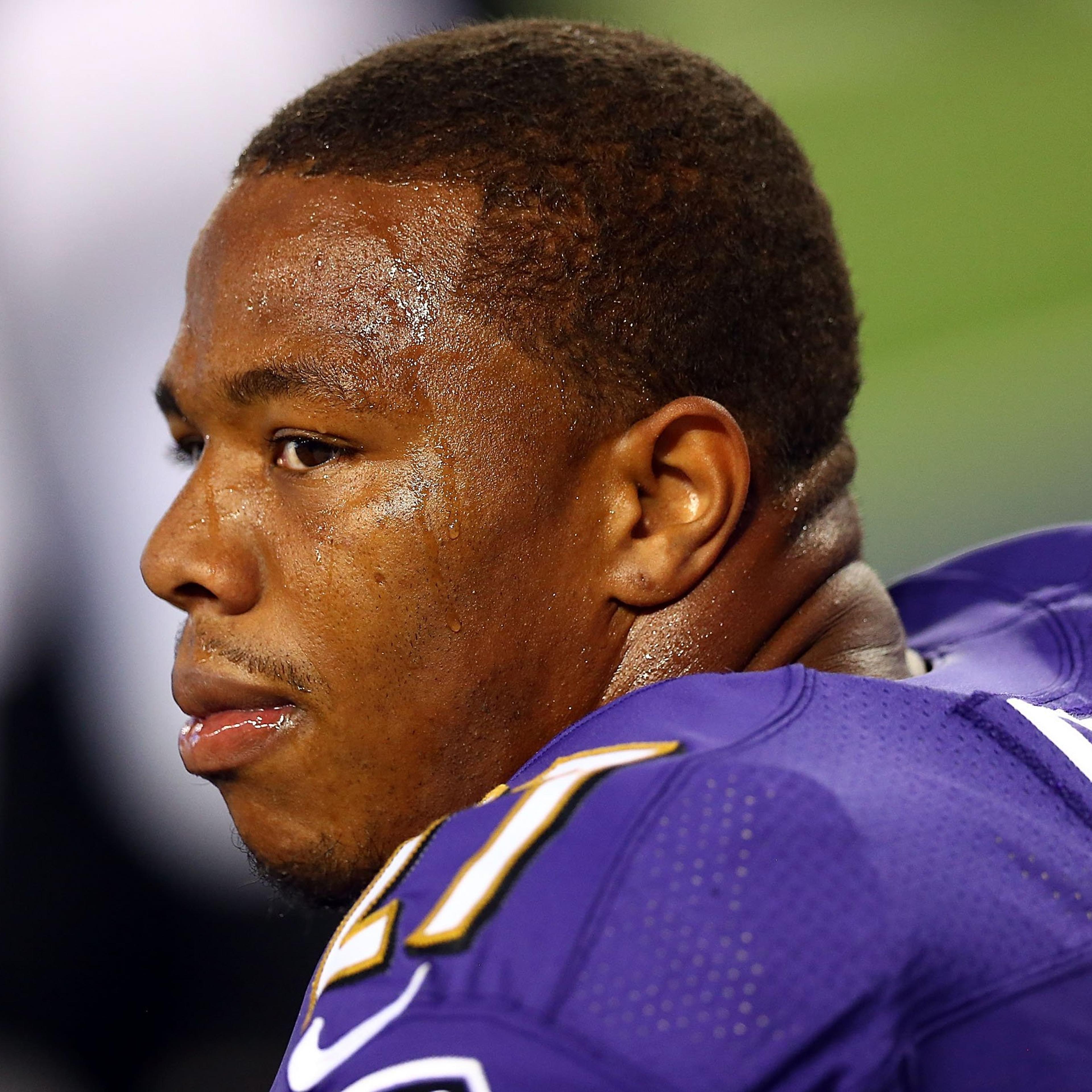 Ray Rice of the Baltimore Ravens sits on the bench against the Dallas Cowboys in the first half of their preseason game on Aug. 16, 2014 in Arlington, Texas.
