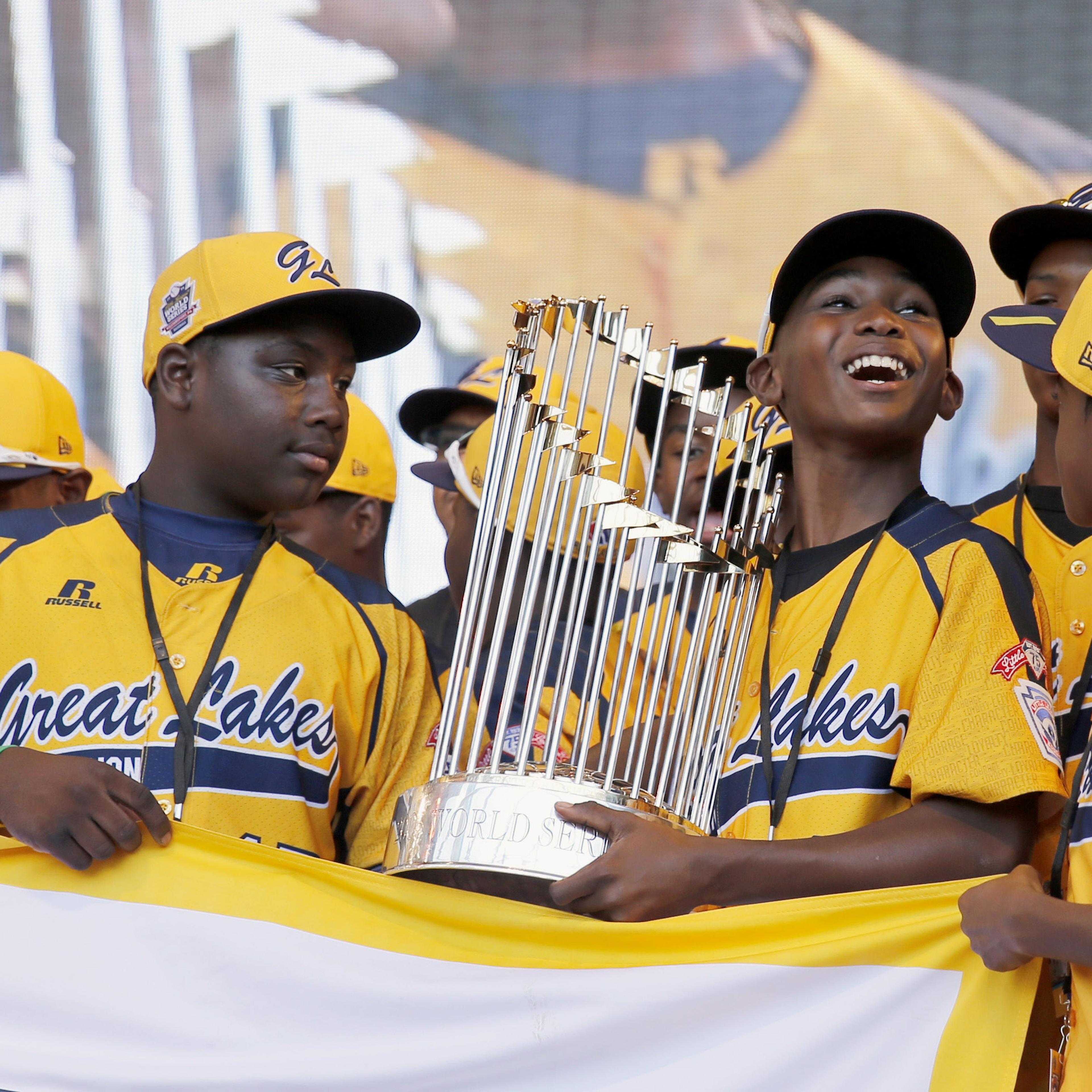 Members of the Jackie Robinson West Little League baseball team participate in a rally in Chicago celebrating the team's U.S. Little League Championship. on Aug. 27, 2014.