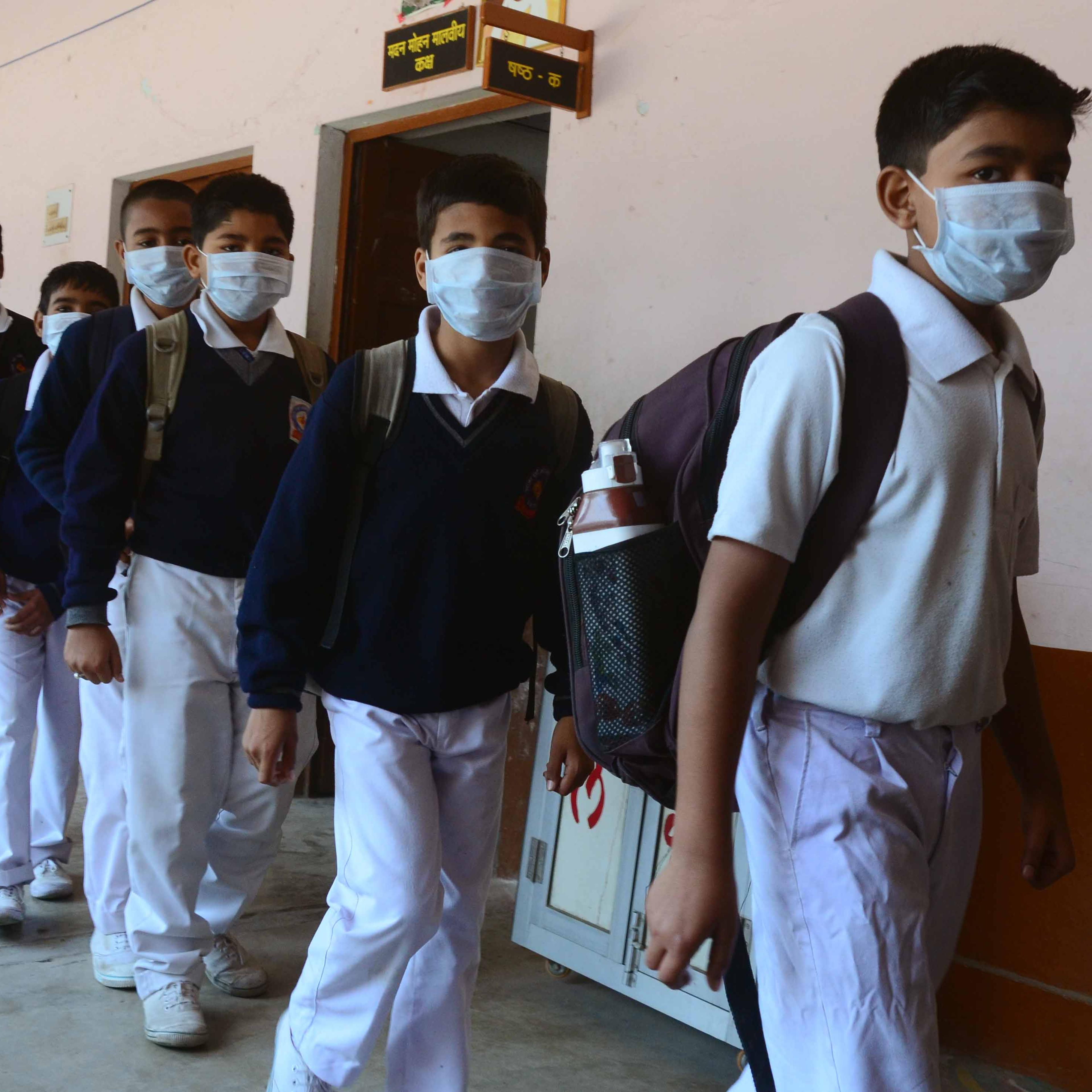 Students wearing masks to prevent getting infected by Swine
