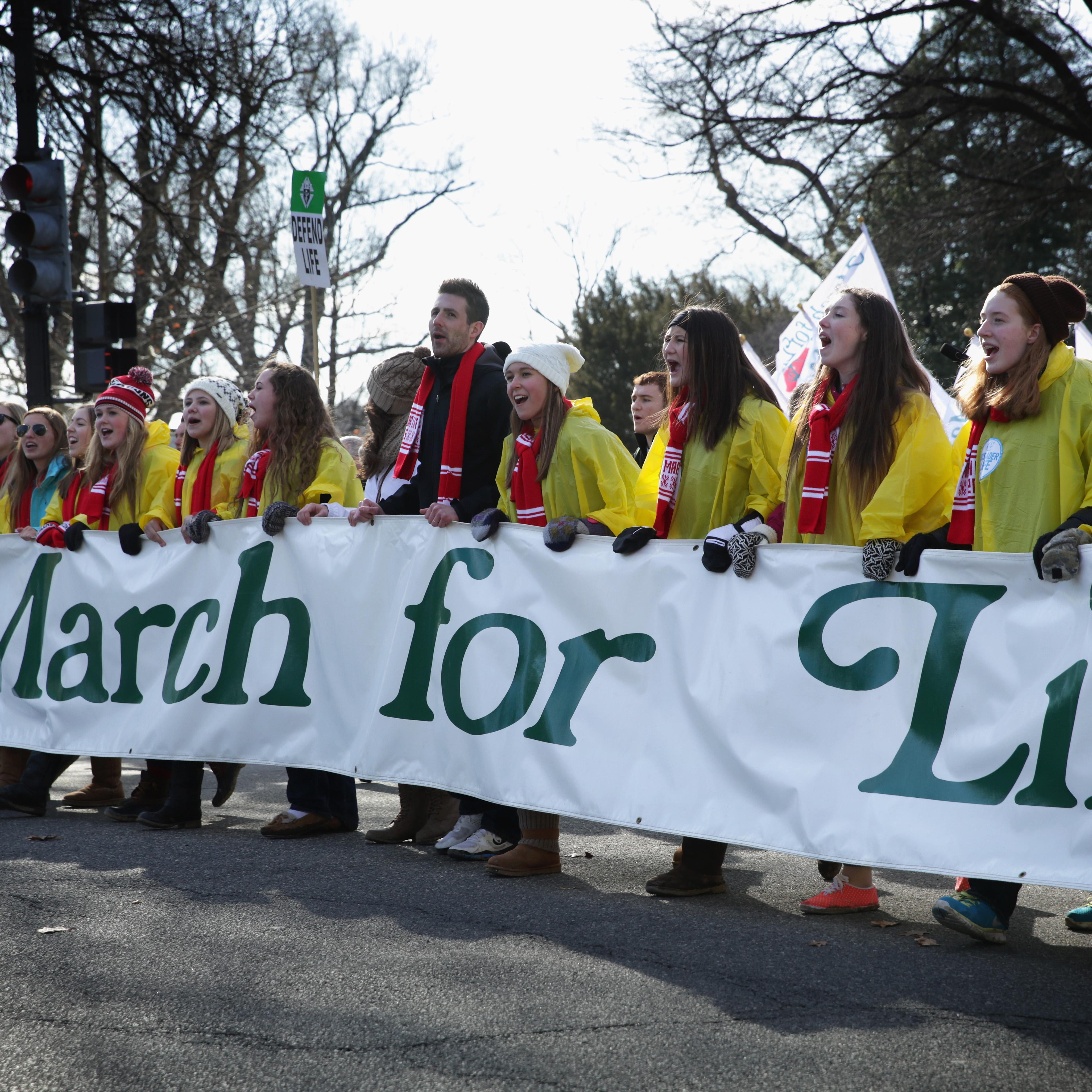 Activists participate in the annual March for Life as they pass in front of the U.S. Capitol in Washington, D.C., on Jan. 22, 2015.