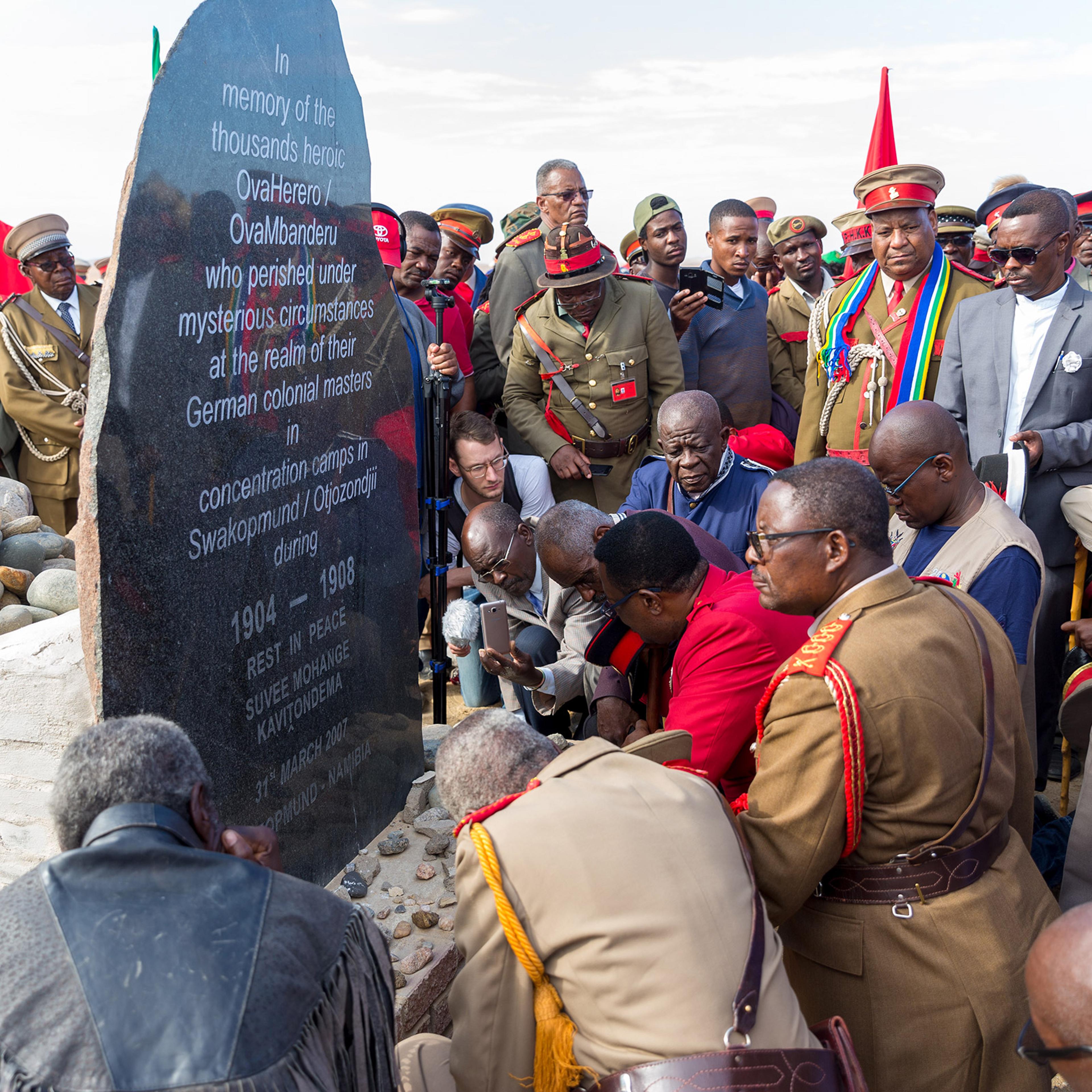 Paramount Chief Adv. Vekuii Rukoro, high-ranked chiefs and other members of the Herero and Nama communities gather around a monument in honor of the Ovaherero and Nama people that were victims of the genocide by German colonial forces at the Swakopmund C