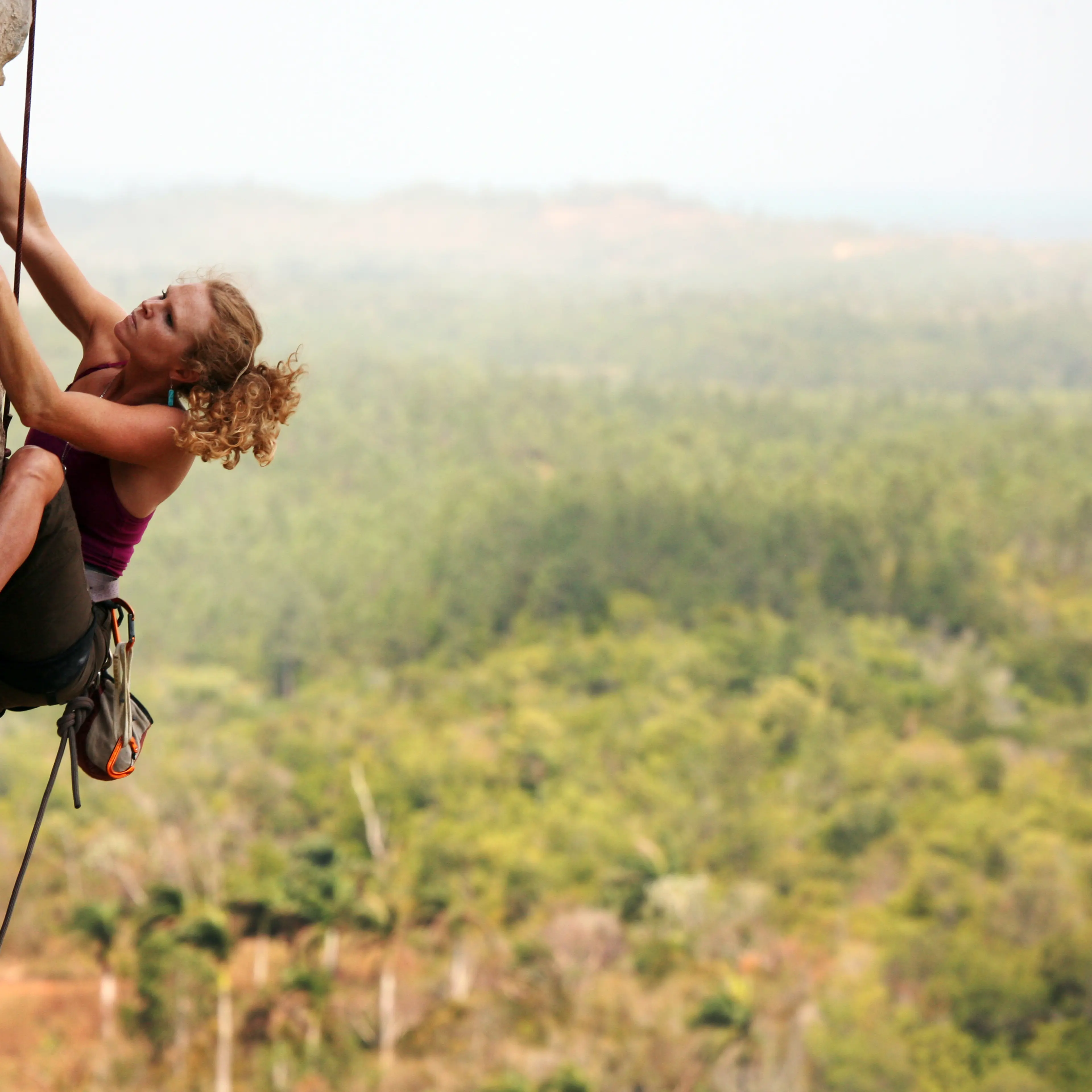 woman-mountain-rock-climbing