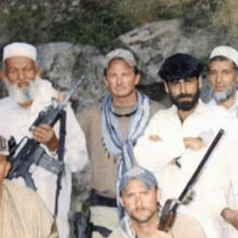 Major Jim Gant, center, with local Afghans and his soldiers in Afghanistan.
